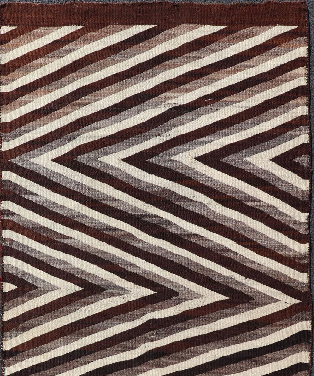 Wool Large Early Navajo Tribal Rug with Large Zig-Zag Design in Brown, Ivory For Sale