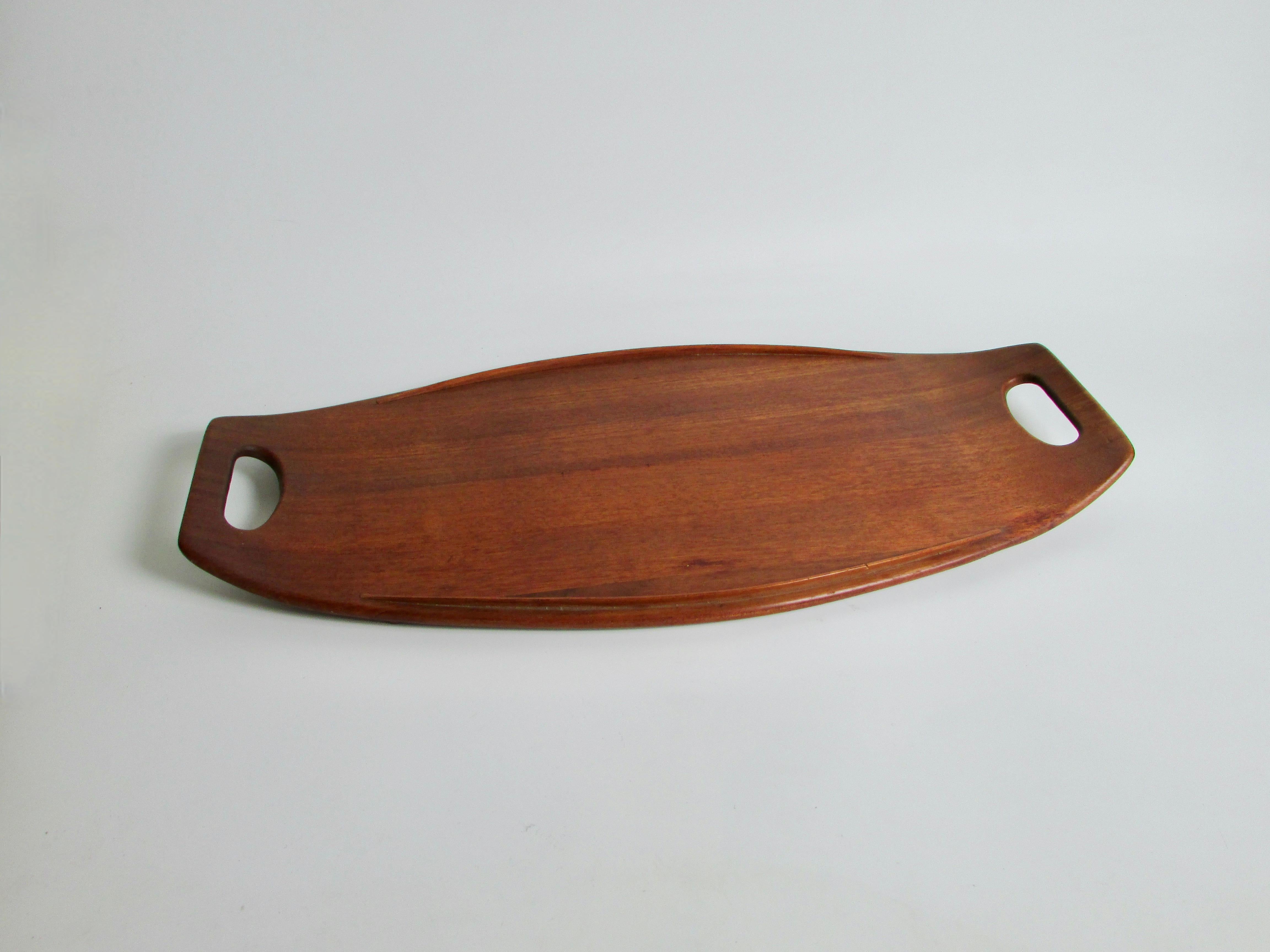 Early Dansk teak tray with duck logo marked JHQ  , staved teak,  Danmark   . Very nice basically un touched condition.