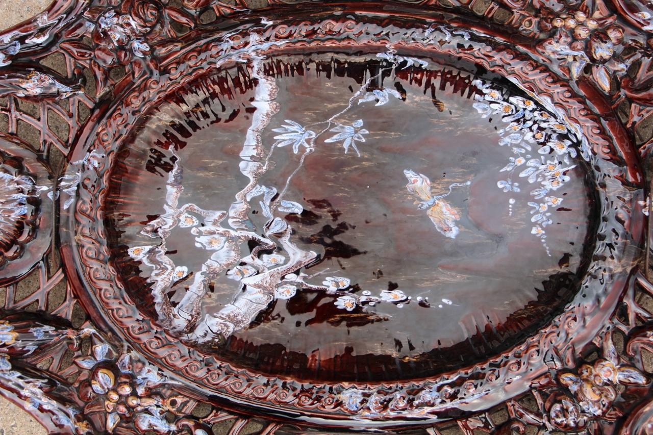 Large Saint-Clément faience platter, from the period when Emile Gallé was artistic director. Superb in its size and decoration, almost certainly a special commission, typical of Gallé's productions. Superb condition.