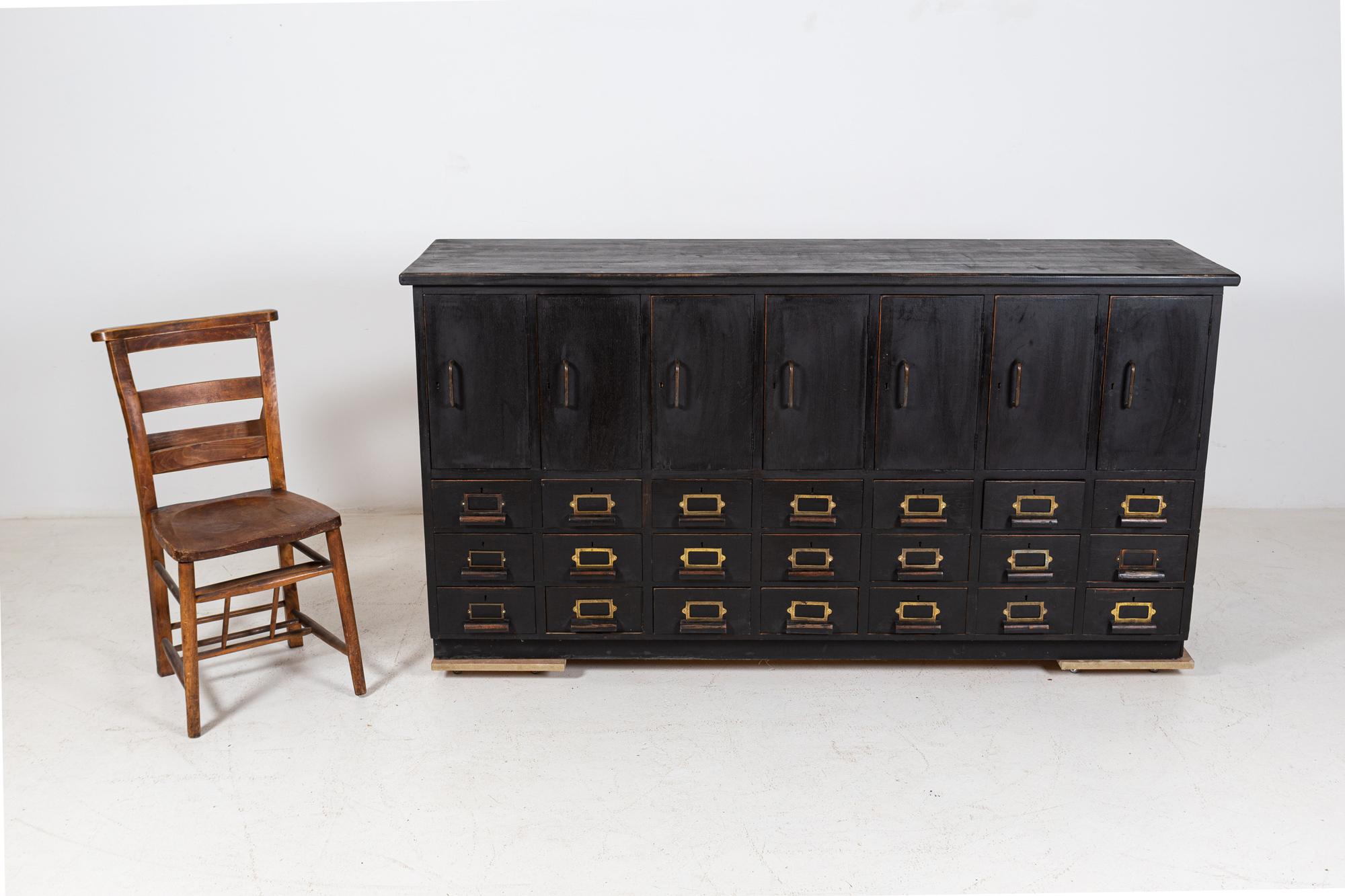 Circa. 1940-50's

Large ebonised English oak panelled locker cabinet

Measures: W 170 x D 49 x H 91 cm.
 
 