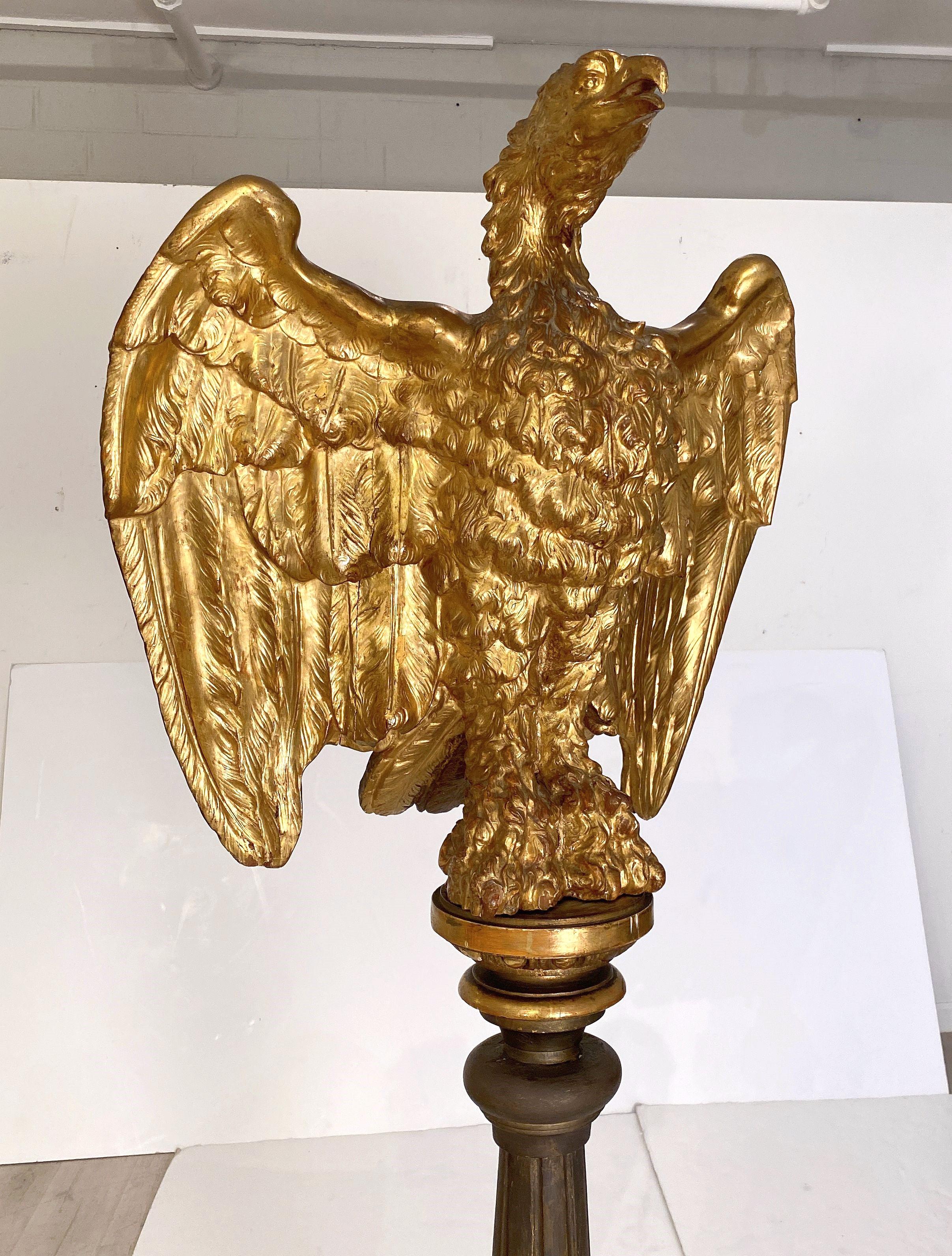 A large carved and gilded wooden eagle lectern, from Wales, c. 1830, for ecclesiastical use - such as sermons and religious readings - in churches, chapels,  and places of worship. 

The finely sculpted eagle, with outstretched wings, adorned with