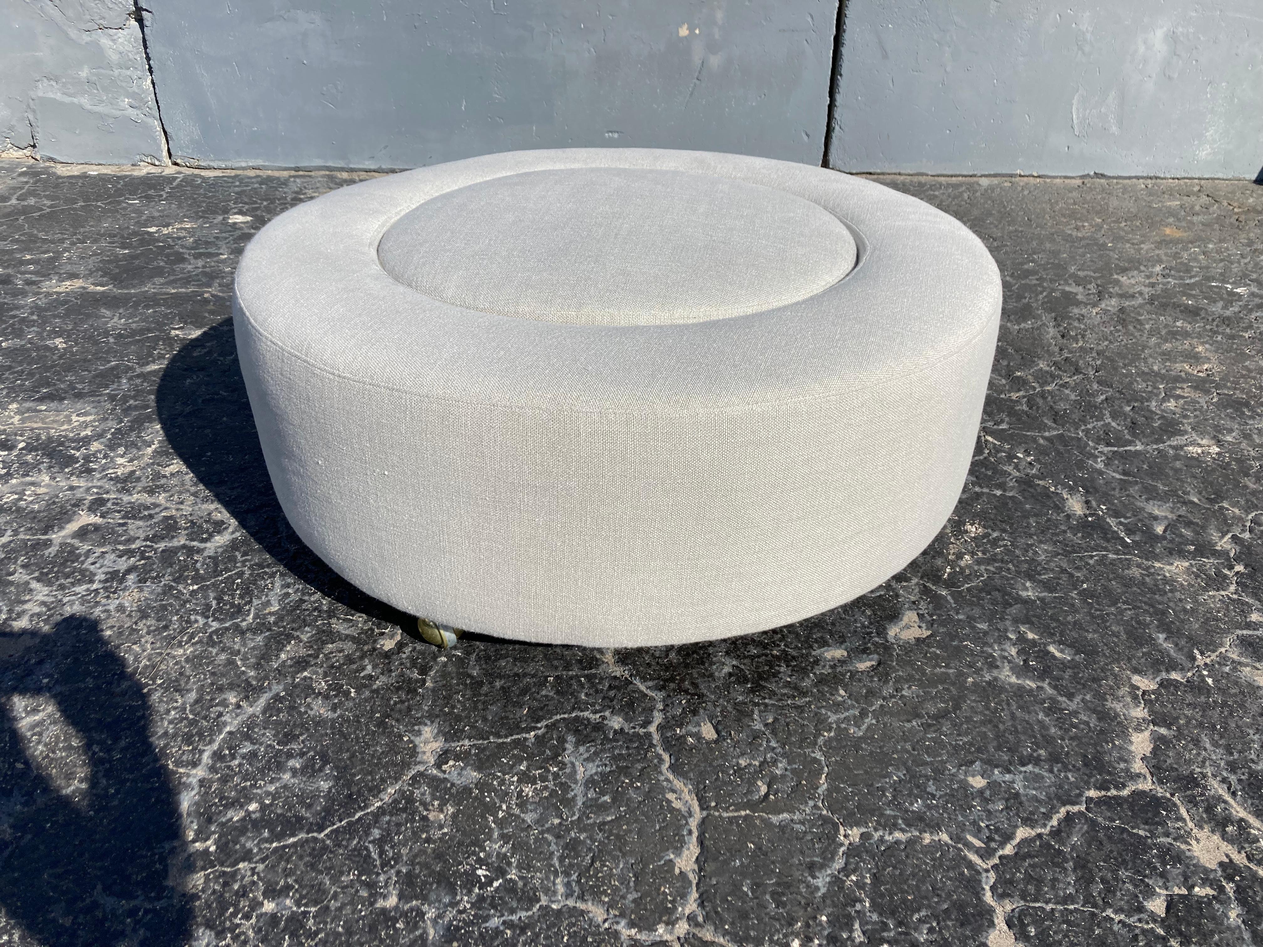 Original Edward Wormley Ottoman for Dunbar. Foam and fabric are new, springs are original. Expertly reupholstered. Original casters. Center cushion is removable.
