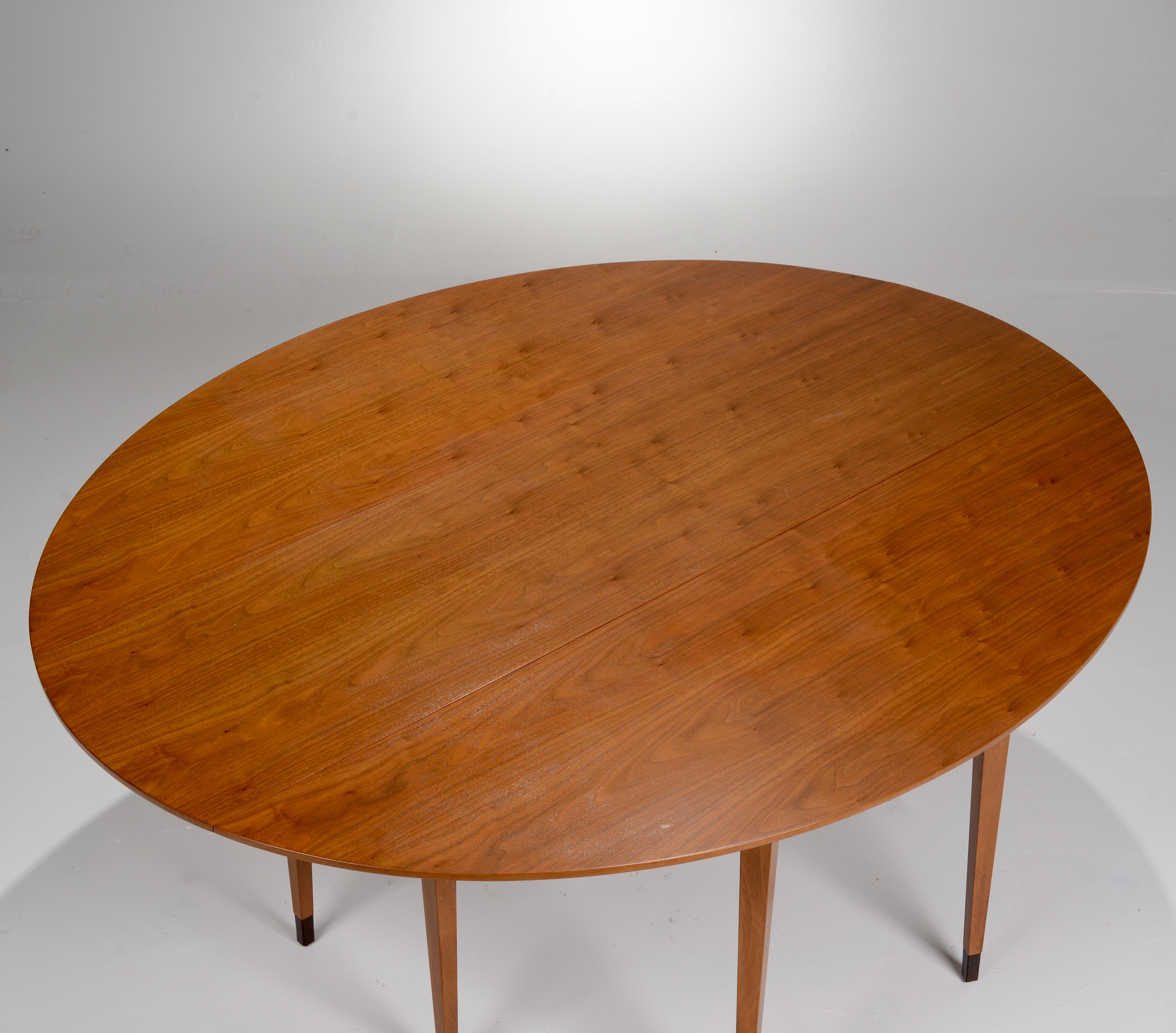 Large Edward Wormley for Dunbar Walnut Oval Drop-Leaf Dining Table In Excellent Condition In Los Angeles, CA