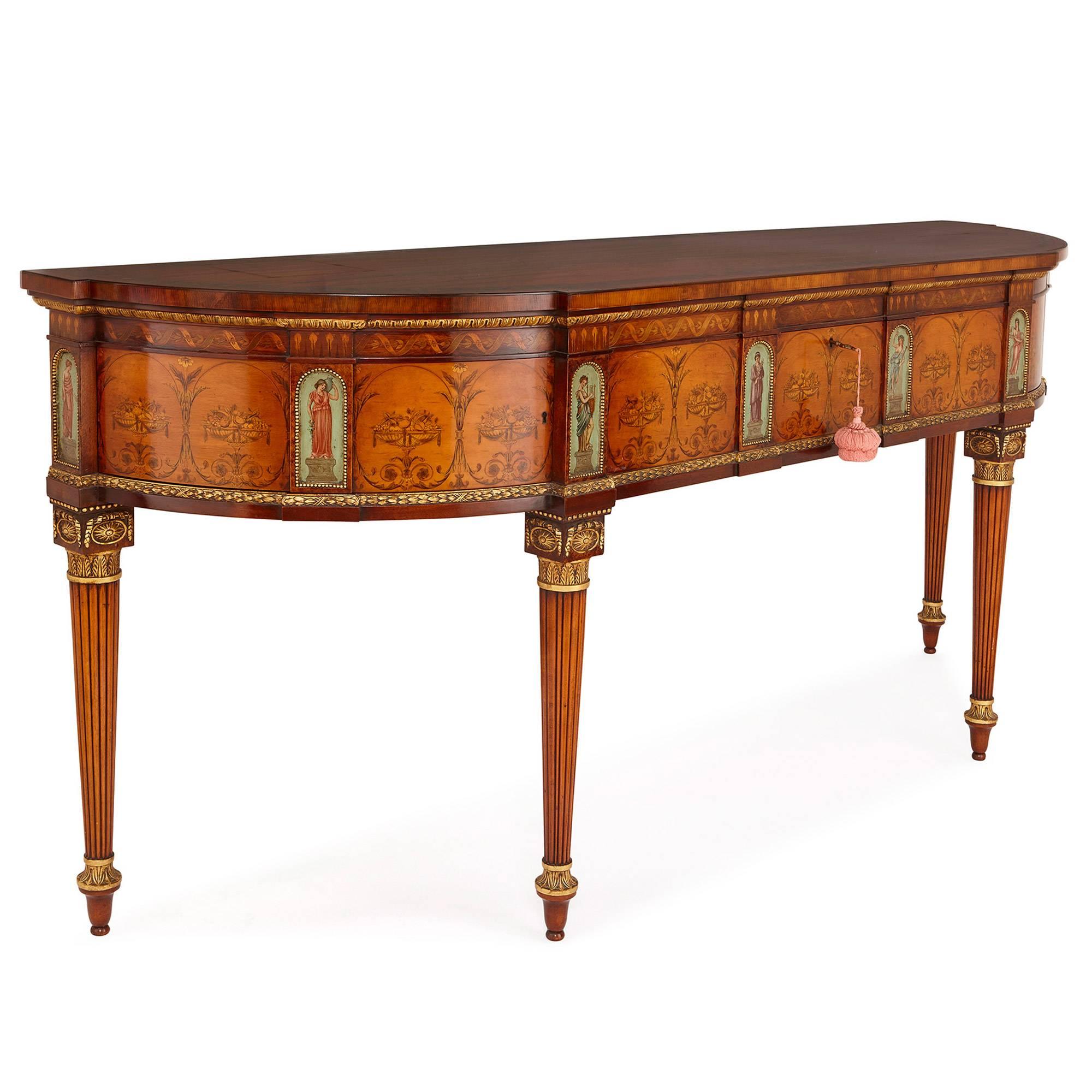 This fine and large sideboard, or console table, commands attention, and yet exudes both the grace and the refined elegance of the neoclassical style, which has enjoyed continued revivals in England from the 18th century onward. This particular