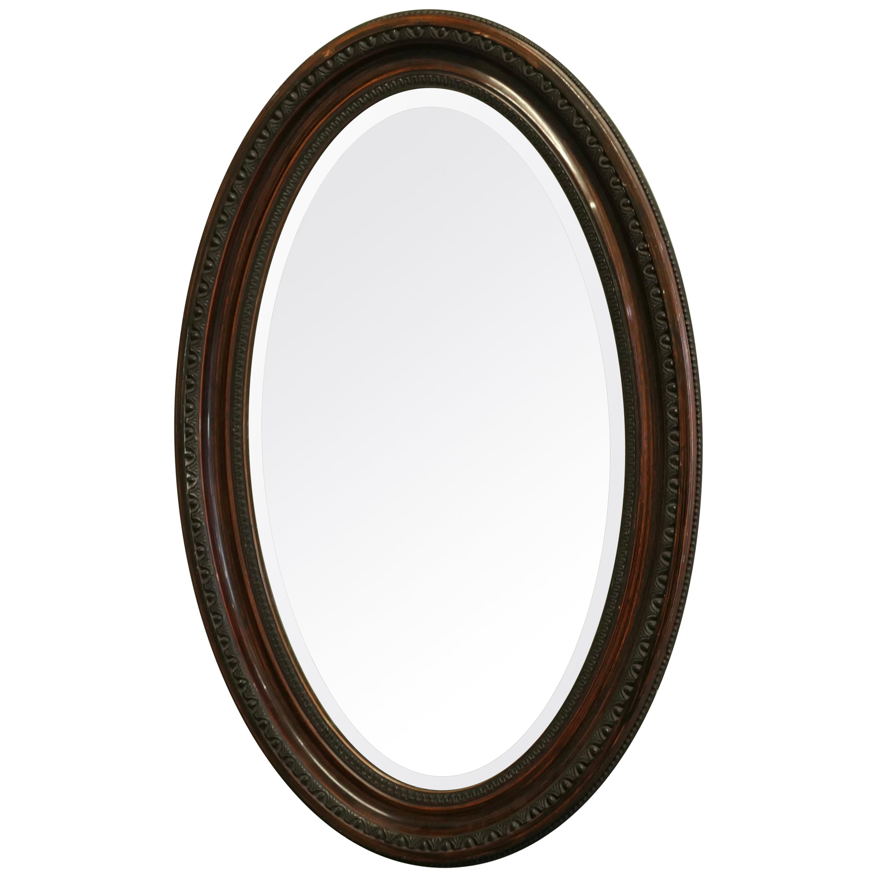 Large Edwardian Wood Finish Oval Mirror This Mirror has a 3” wide moulded oval