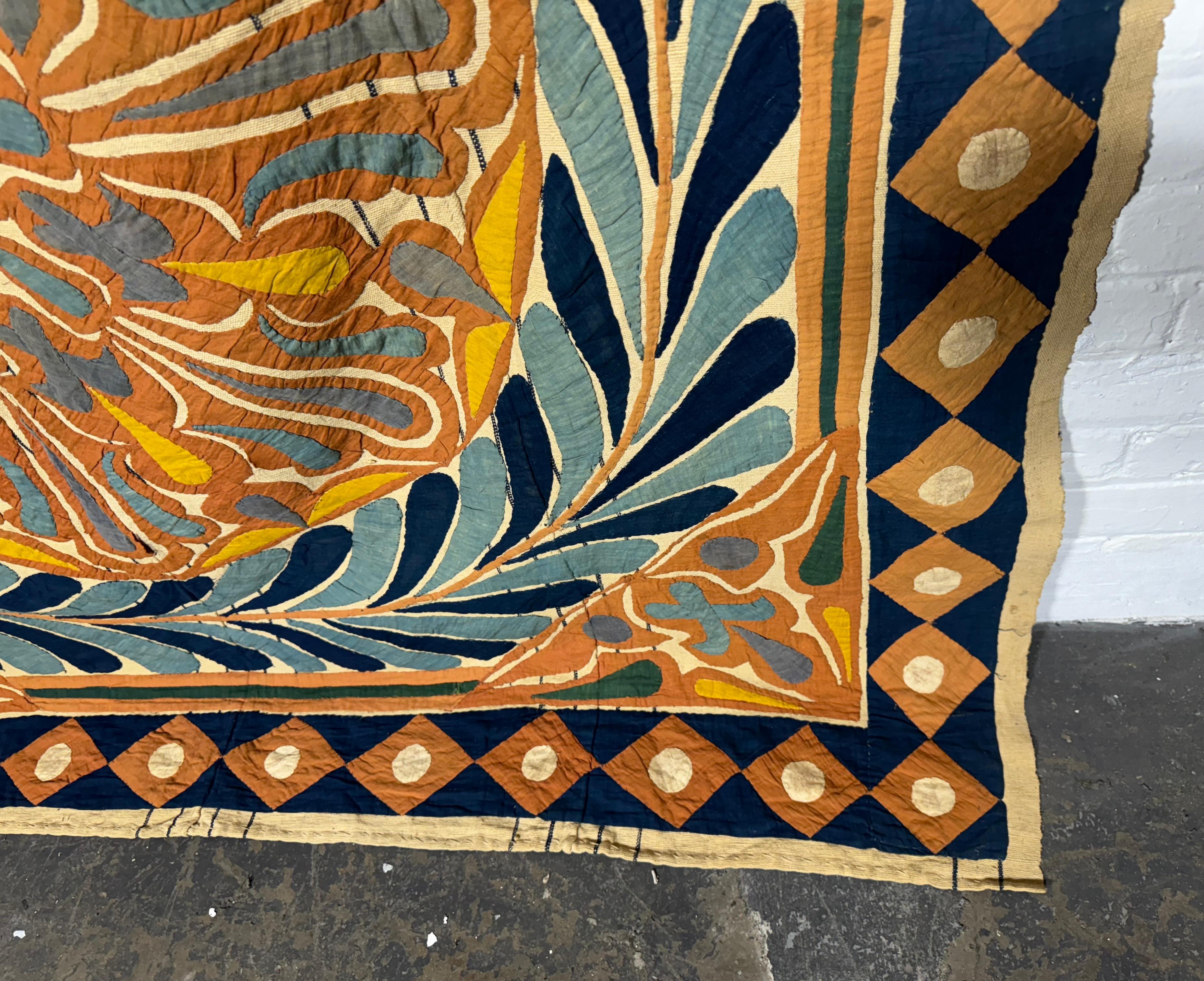 Large Egyptian cotton applique Tent Panel / wall hanging , early 20th century.. various calligraphic inscriptions and devices, with central mihrab, Nice original condition,, one petal needs sewing. few minor spots (soiling)  

Egyptian tentmaking