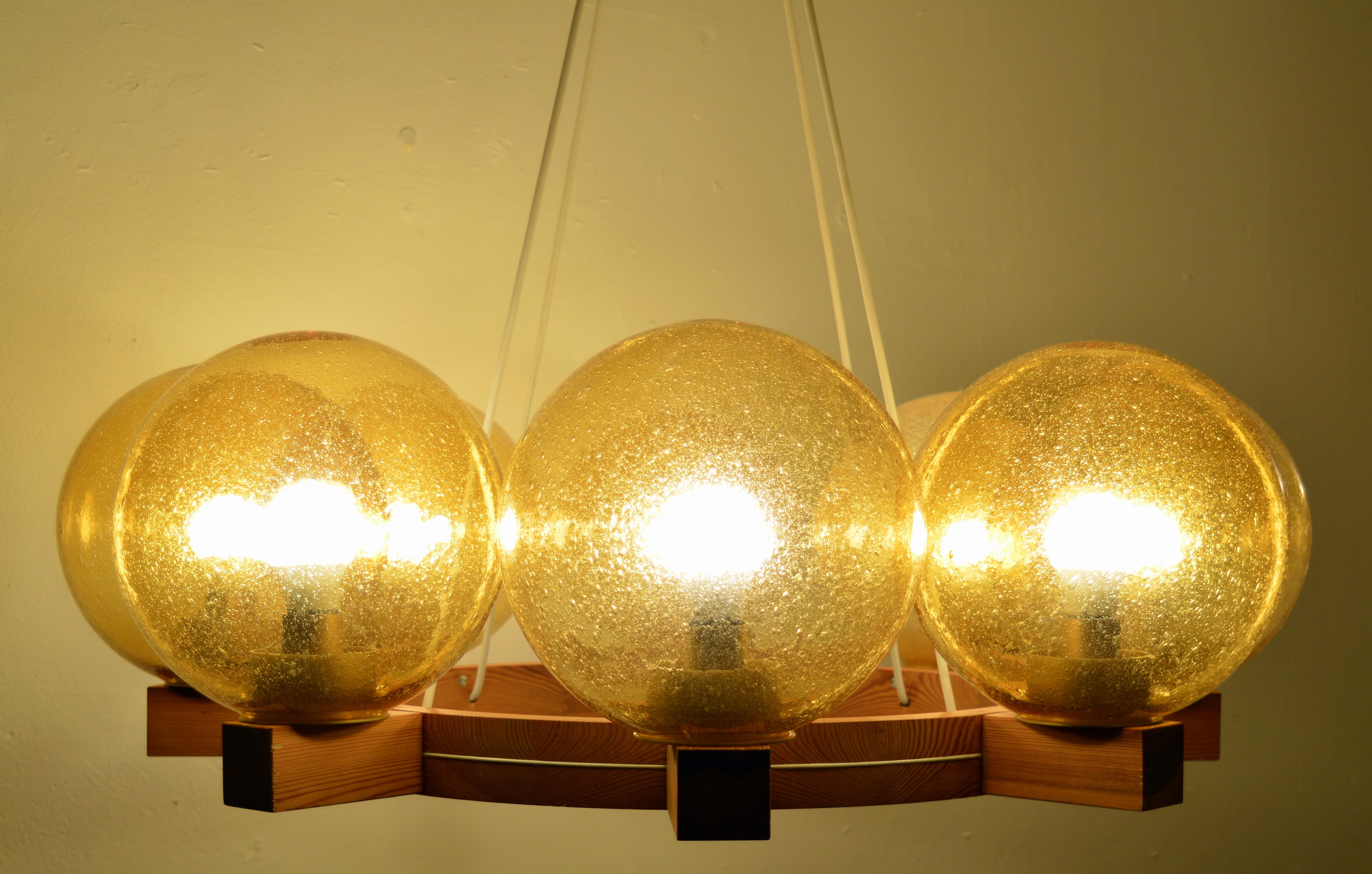 Scandinavian Modern Large Eight Arms Solid Pine Chandelier with Glass Shades by Luxus Sweden, 1960s