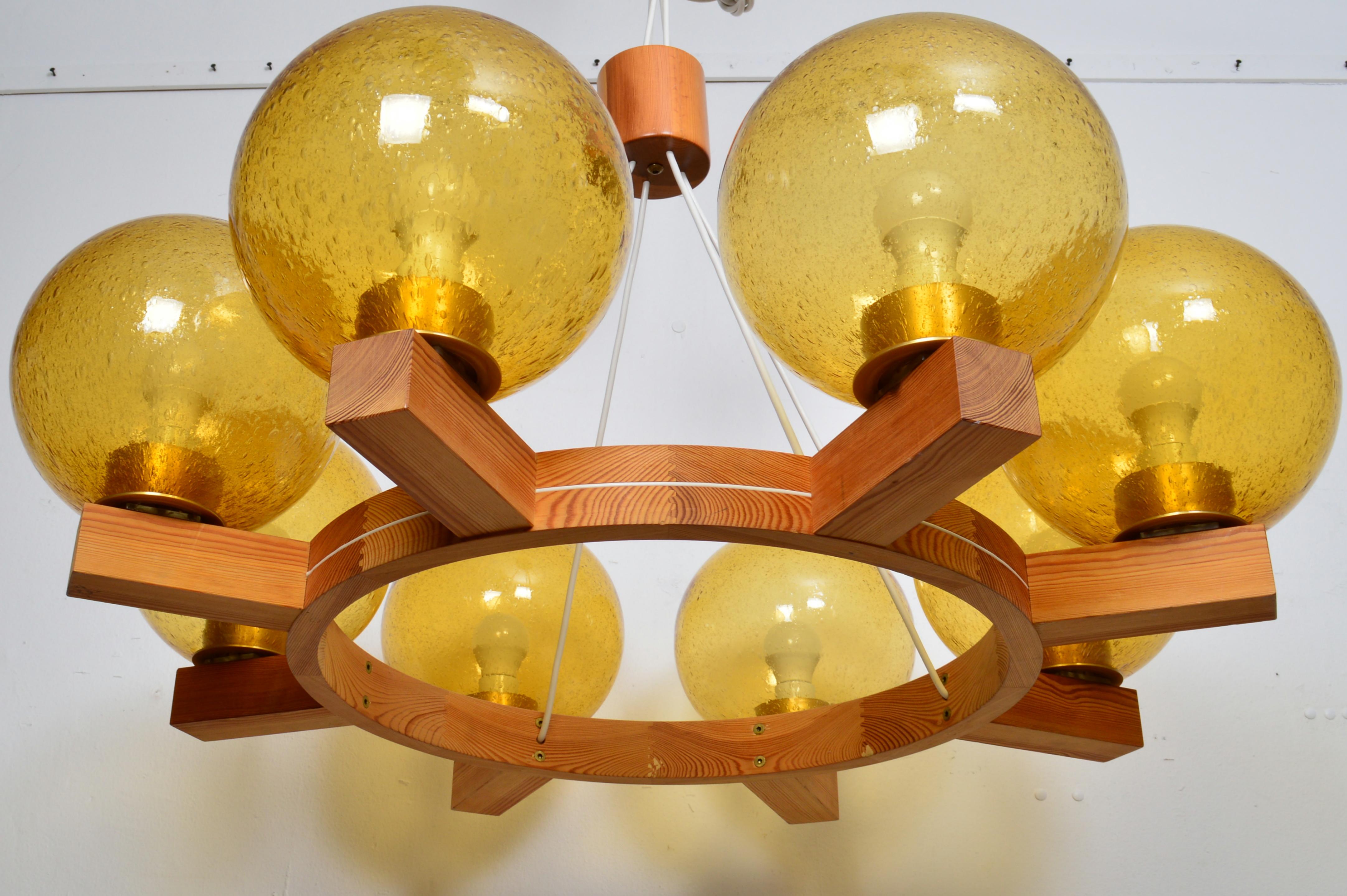 Scandinavo moderno Large Eight Arms Solid Pine Chandelier with Glass Shades by Luxus Sweden, 1960s in vendita