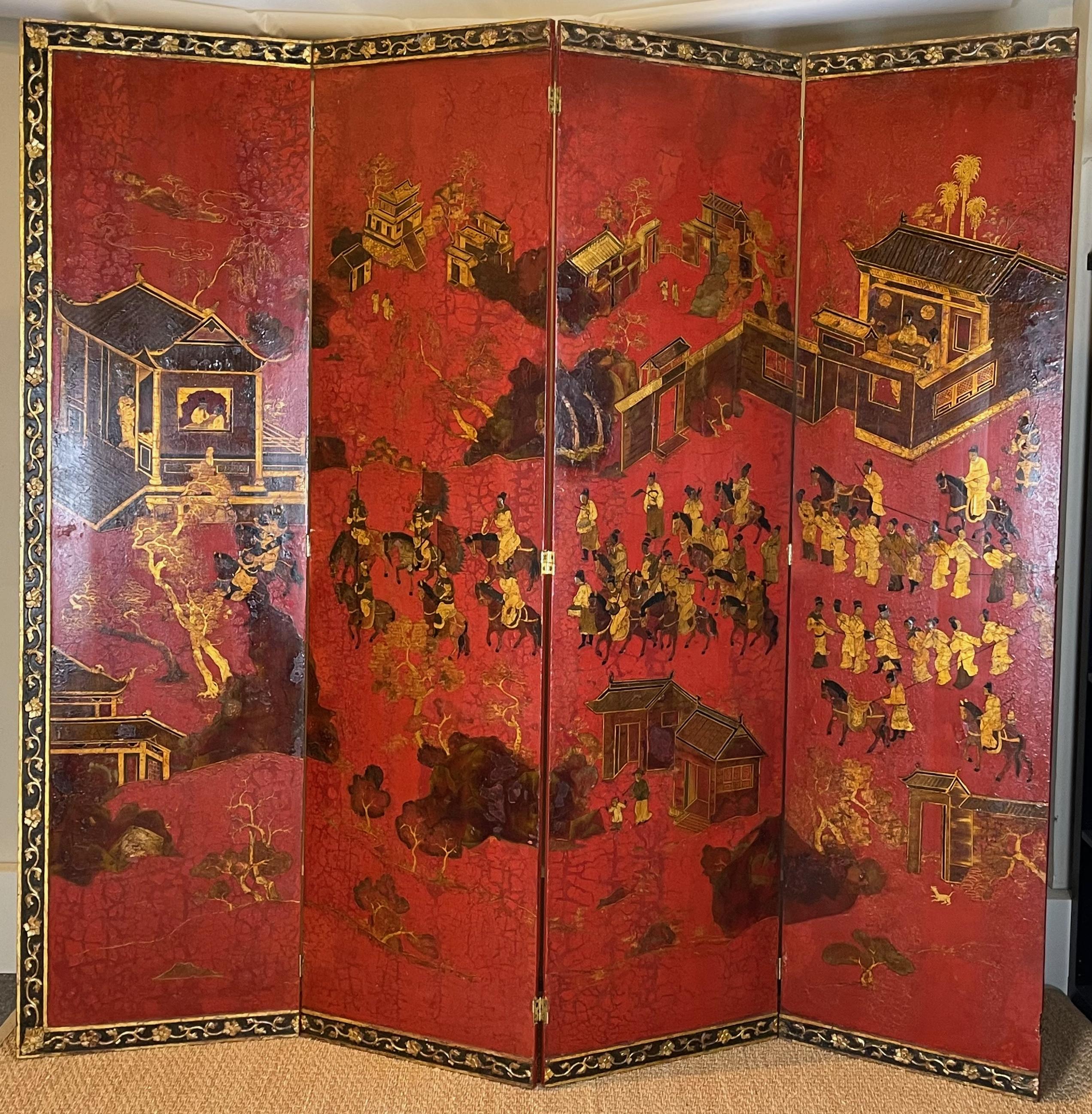 Grand paravent anglais du XIXe siècle à huit panneaux en laque à décor écarlate et doré dans le goût chinois représentant une armée triomphante entrant dans un village.