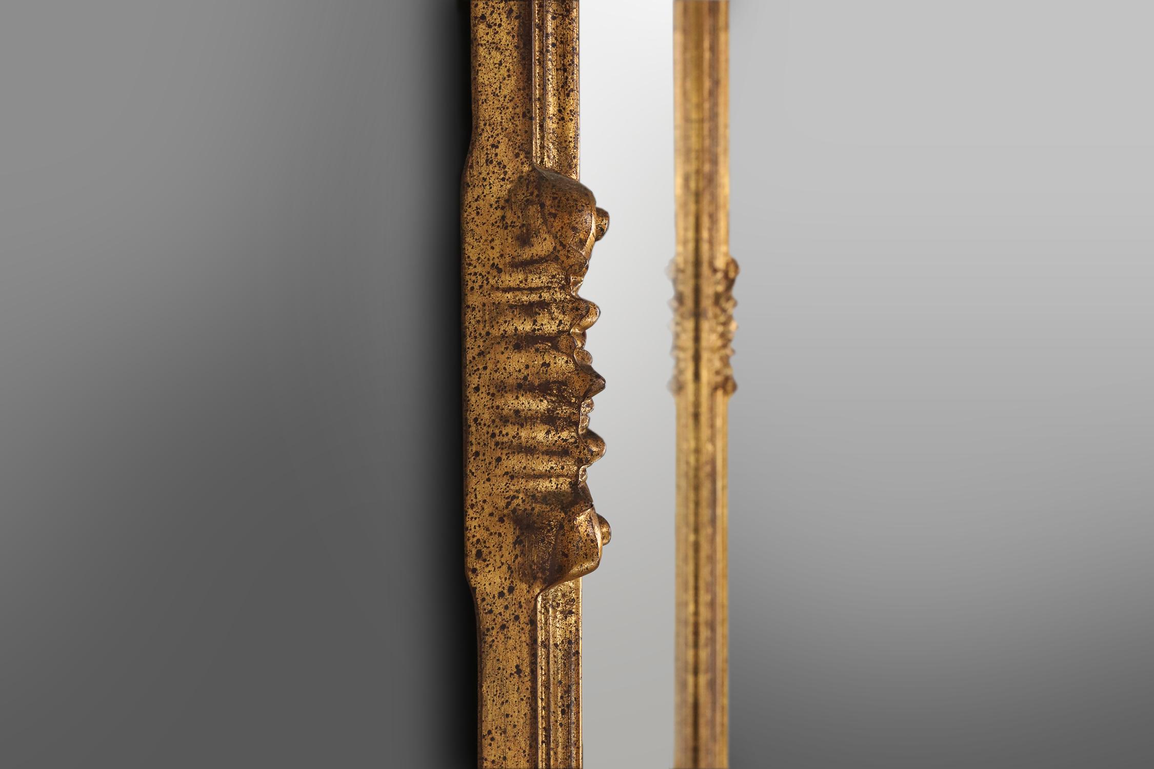 Romantic Large elegant gilted mirror with stunning ornamentation on the top, Deknudt  For Sale