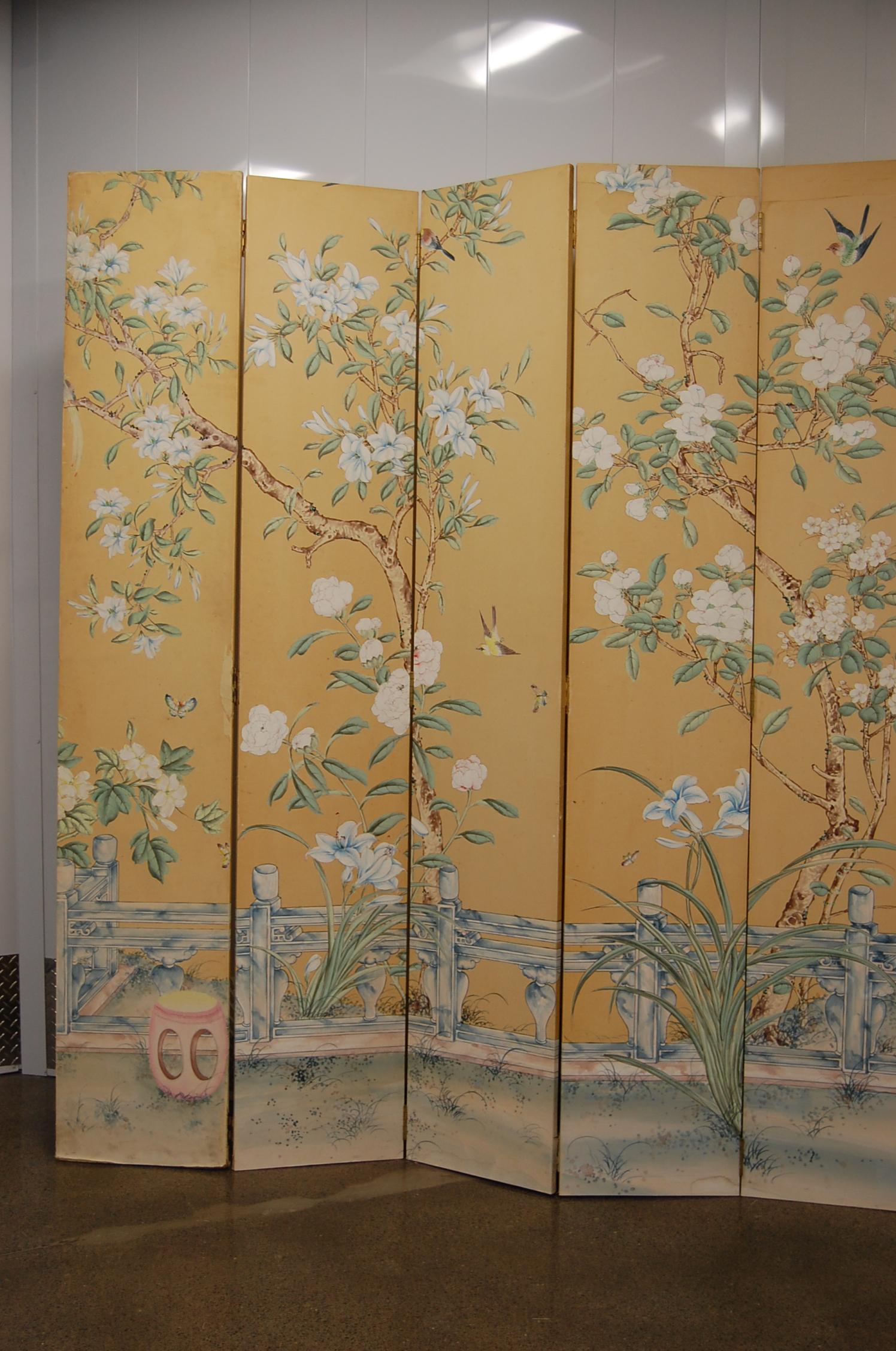 An eleven-panel folding screen covered in Chinese hand painted silk, if opened flat it measures 14 feet 8 inches wide, 90 inches tall. We made this for Mr. & Mrs. Charles Weaver of Pittsburgh in the late 1960s.
