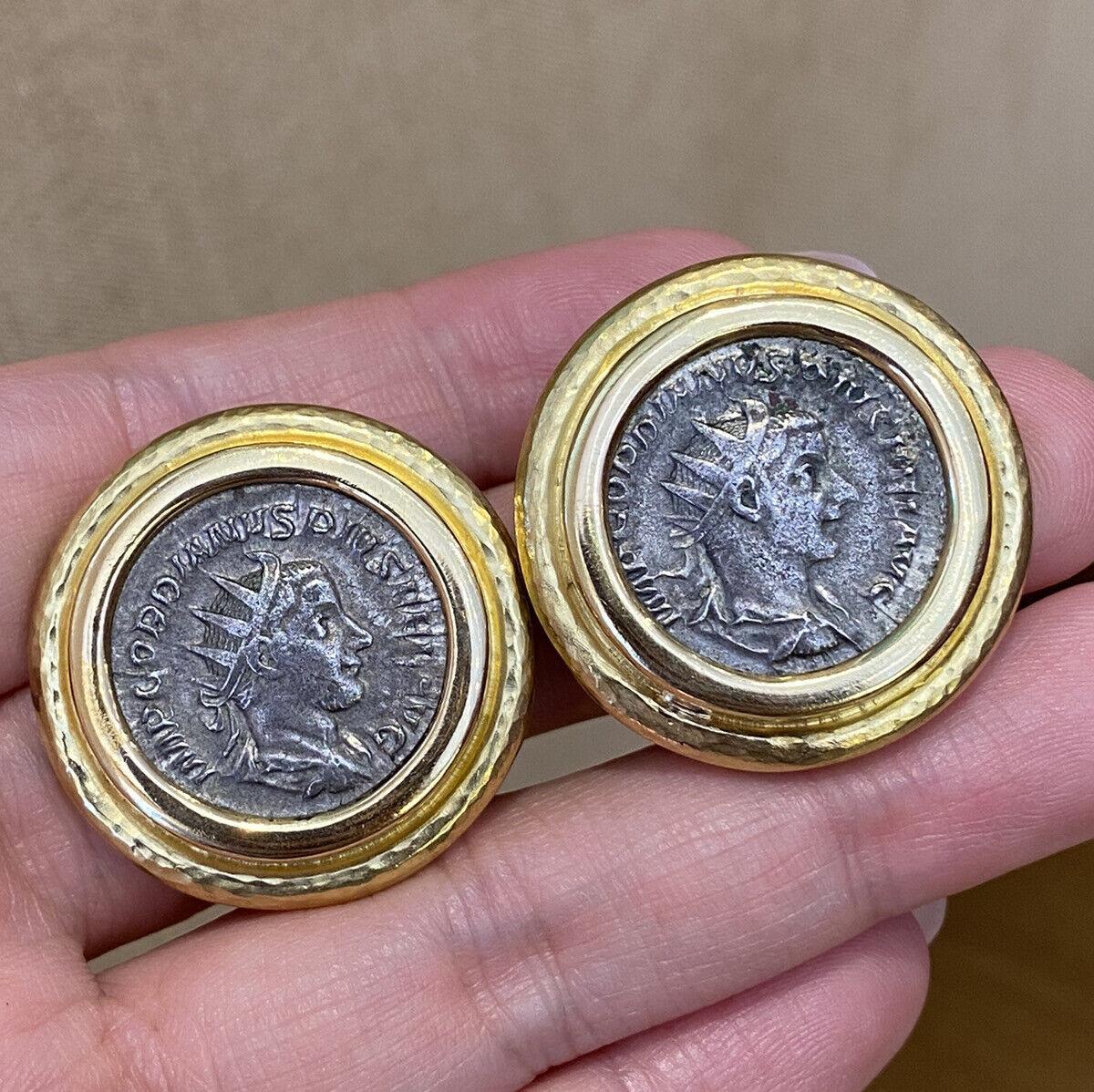Large ELIZABETH LOCKE Coin Button Earrings in 18k Yellow Gold

Large Coin Button Earrings by Elizabeth Locke feature a pair of large Coins, inspired by the Ancient Greek and Romans, bezel-set hammered in 18k Yellow Gold.  The earrings are secured by