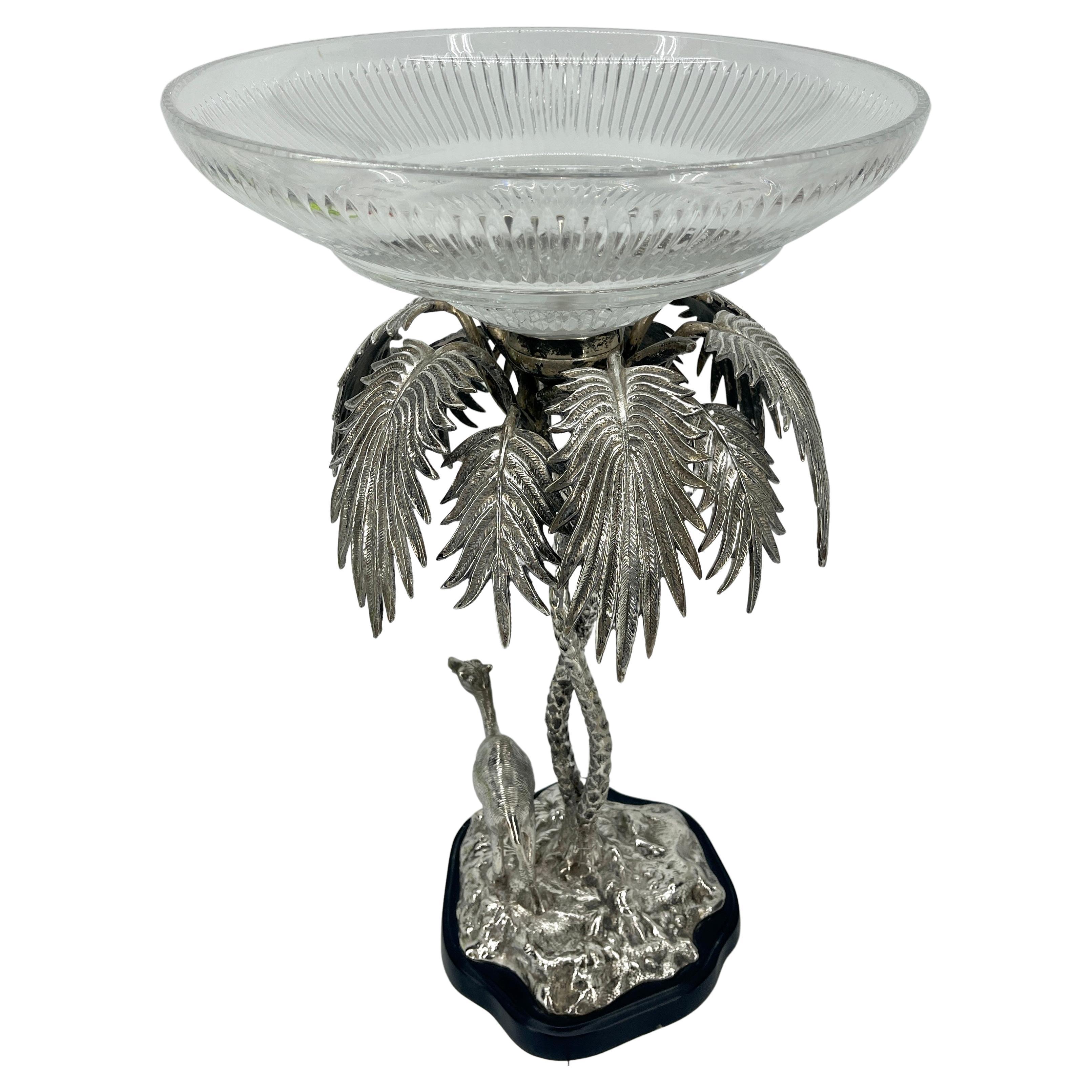 Large Victorian Silver Plate Centerpiece and Matching Cut Crystal Dish With Camel and Palm Tree Decorations. 

Made in the mid 19th Century by Elkington, Mason & Co., this spectacular Victorian centerpiece has a central glass bowl.