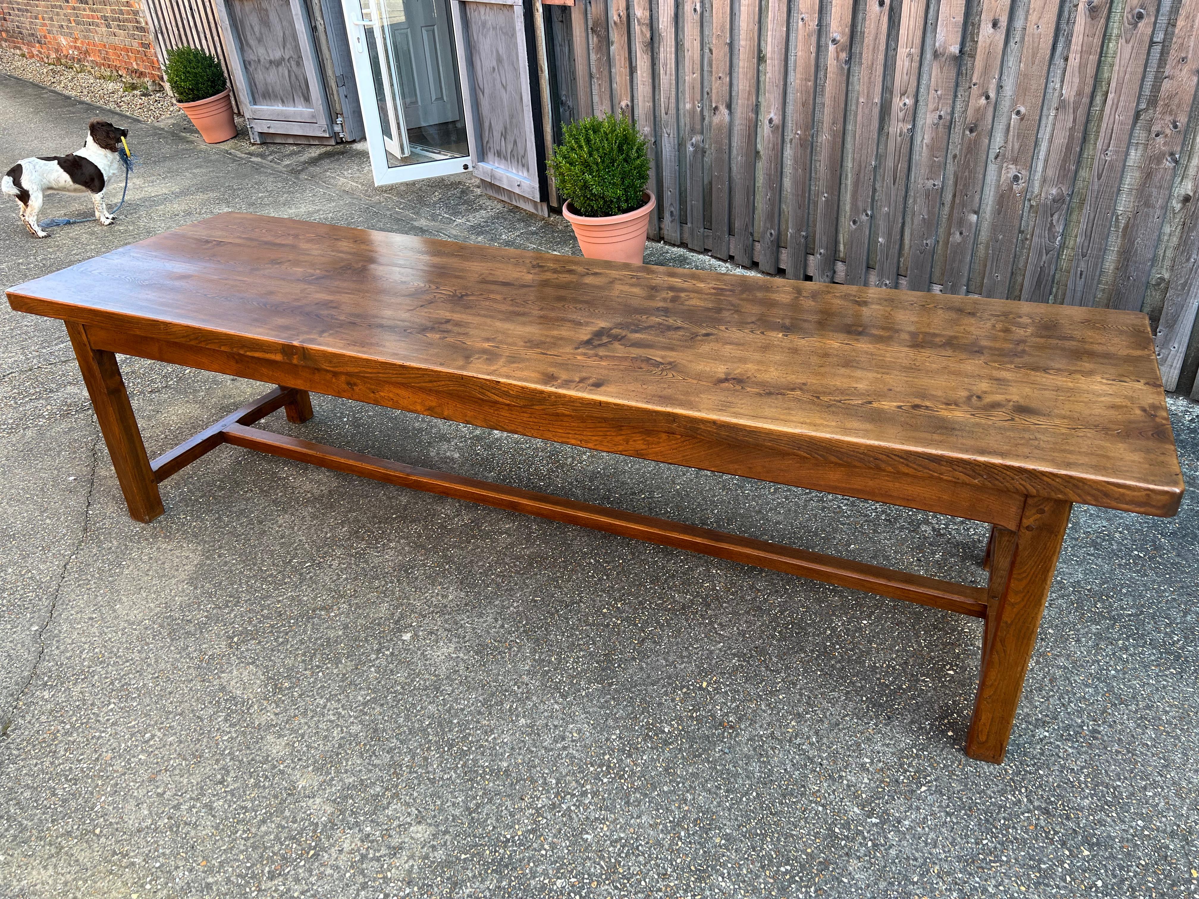 Large Elm 19th Century superior quality farmhouse table of lovely colour and patina with thick top and gorgeous sturdy base. The base has a centre stretcher and the table stands very well with great proportions.  Great original condition.  This