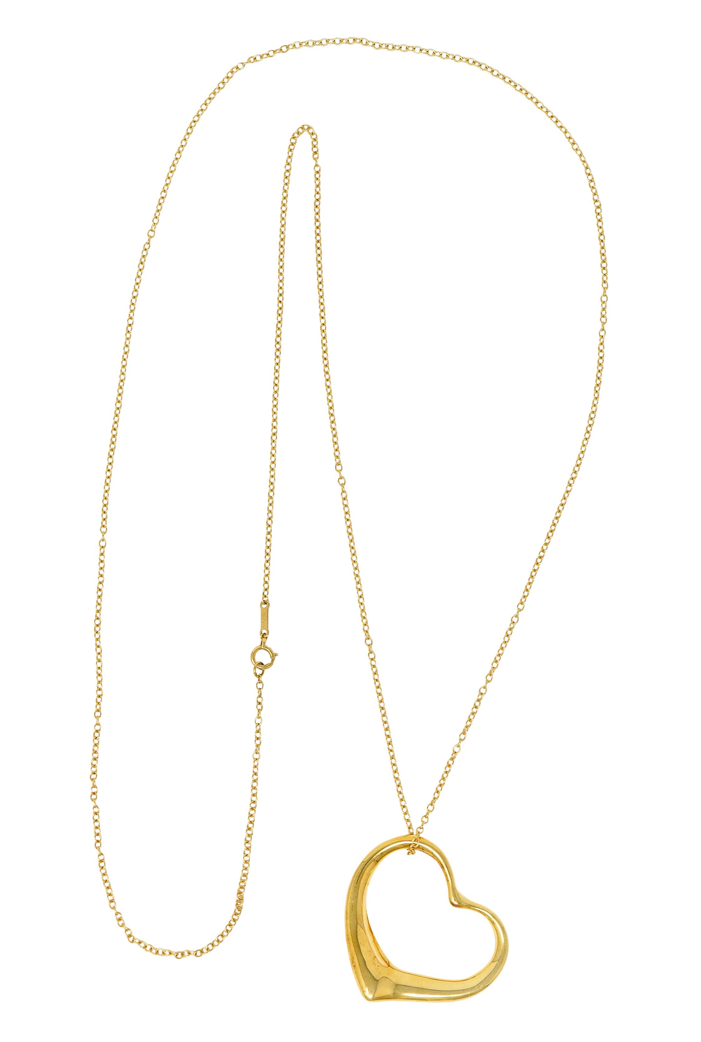 Pendant designed as polished gold open heart motif

Suspending from a classic gold cable chain completed by a spring ring clasp

Both are signed Tiffany & Co. Peretti Spain

Both stamped 750 for 18 karat gold

From the Open Heart collection, circa