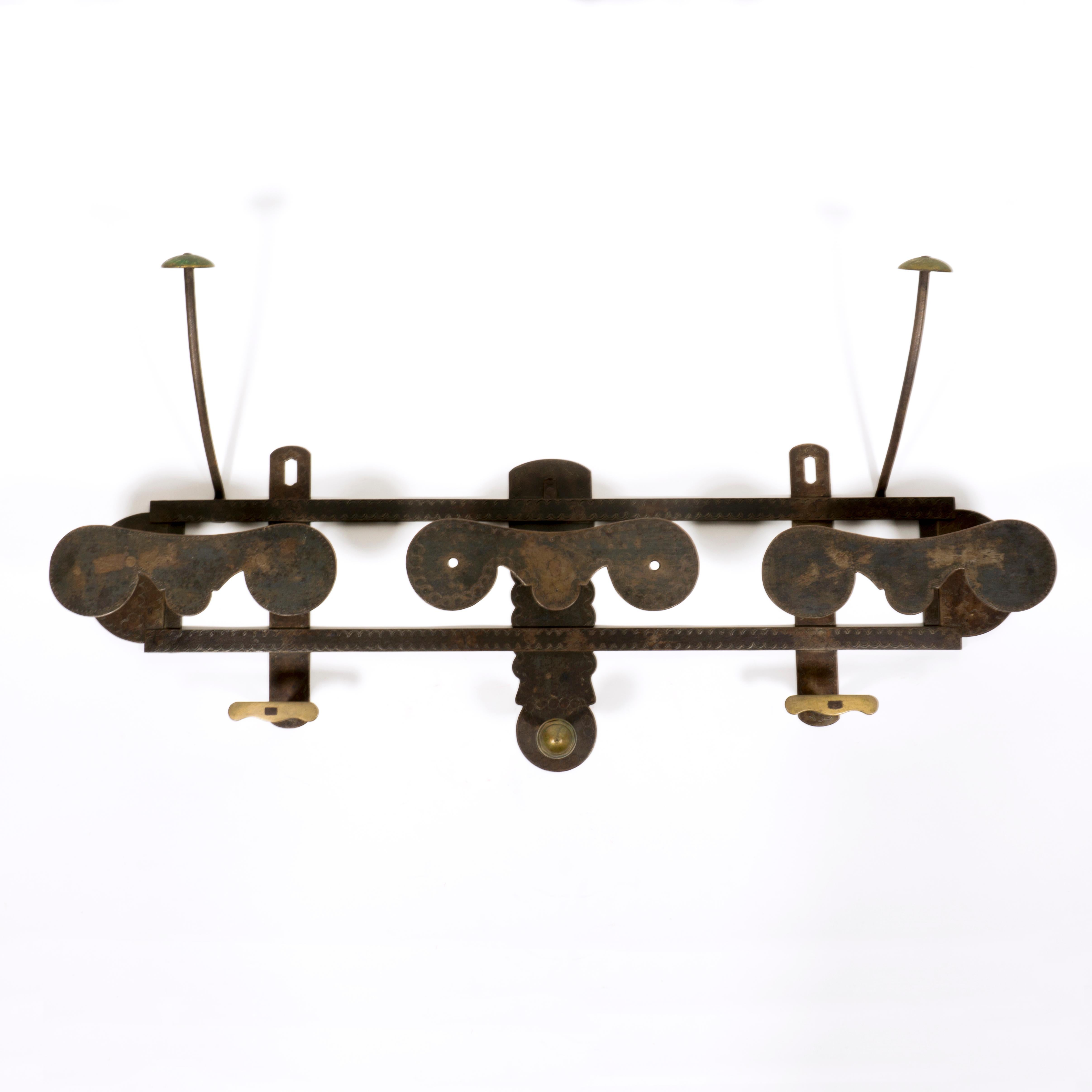 Embossed Large embossed Iron and Brass Vintage Wall Mounted Coat Rack from Italy  For Sale