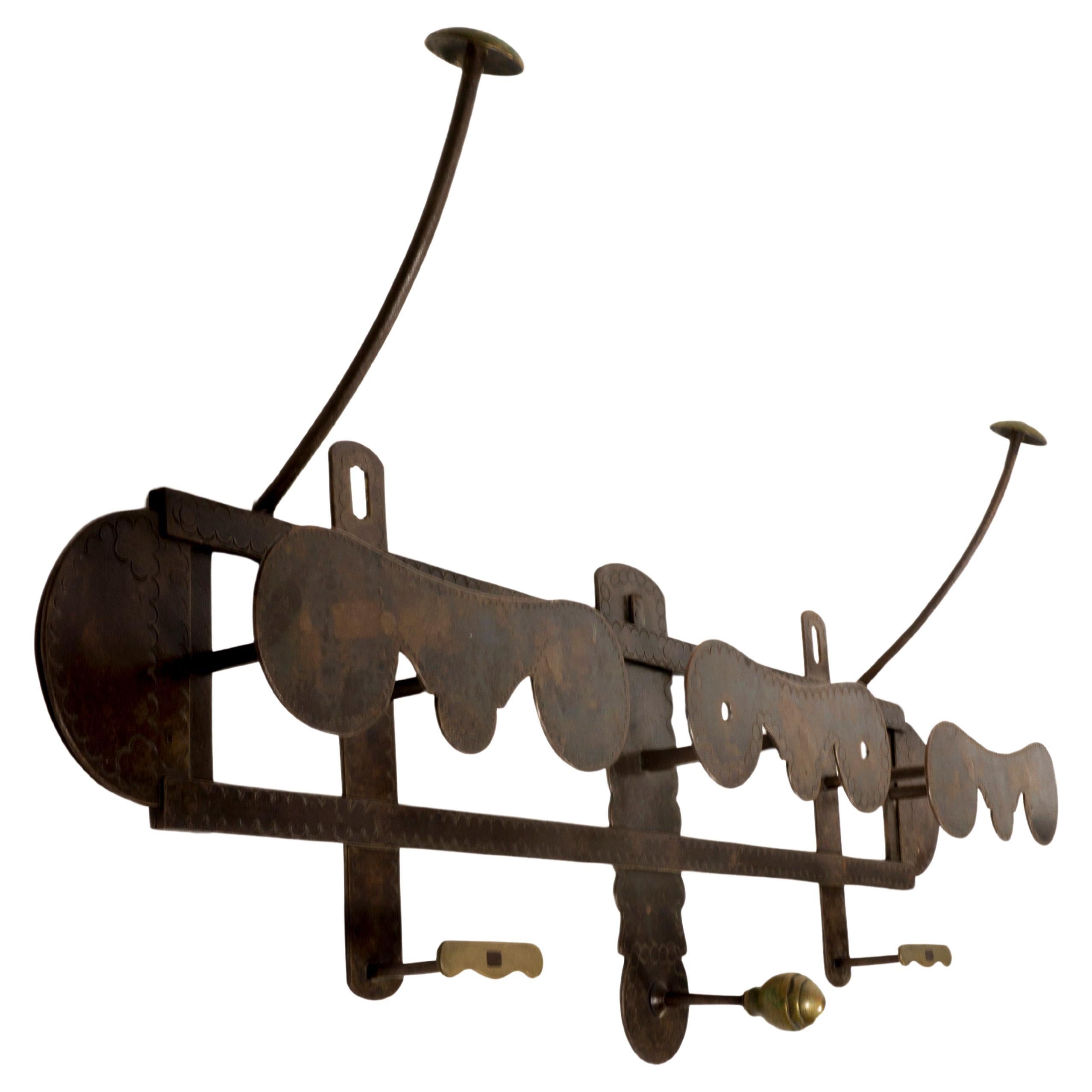 Large embossed Iron and Brass Vintage Wall Mounted Coat Rack from Italy  For Sale