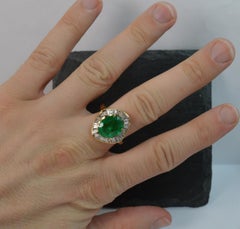 Large Emerald and 2.00 Carat Diamond 18 Carat Gold Cluster Halo Ring