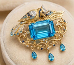 Large Emerald Cut Swiss Blue Topaz Bird Brooch 14K Yellow Gold Diamond Sapphire