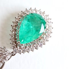 Large 5.13 Karat Emerald Pendant and Diamonds on 18 Karat White Gold