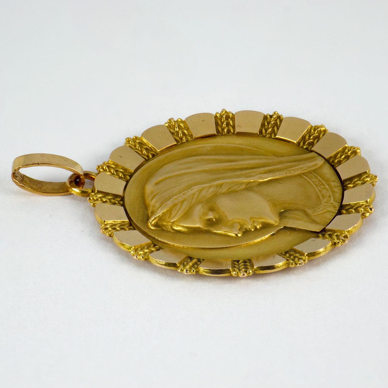 large virgin mary pendant