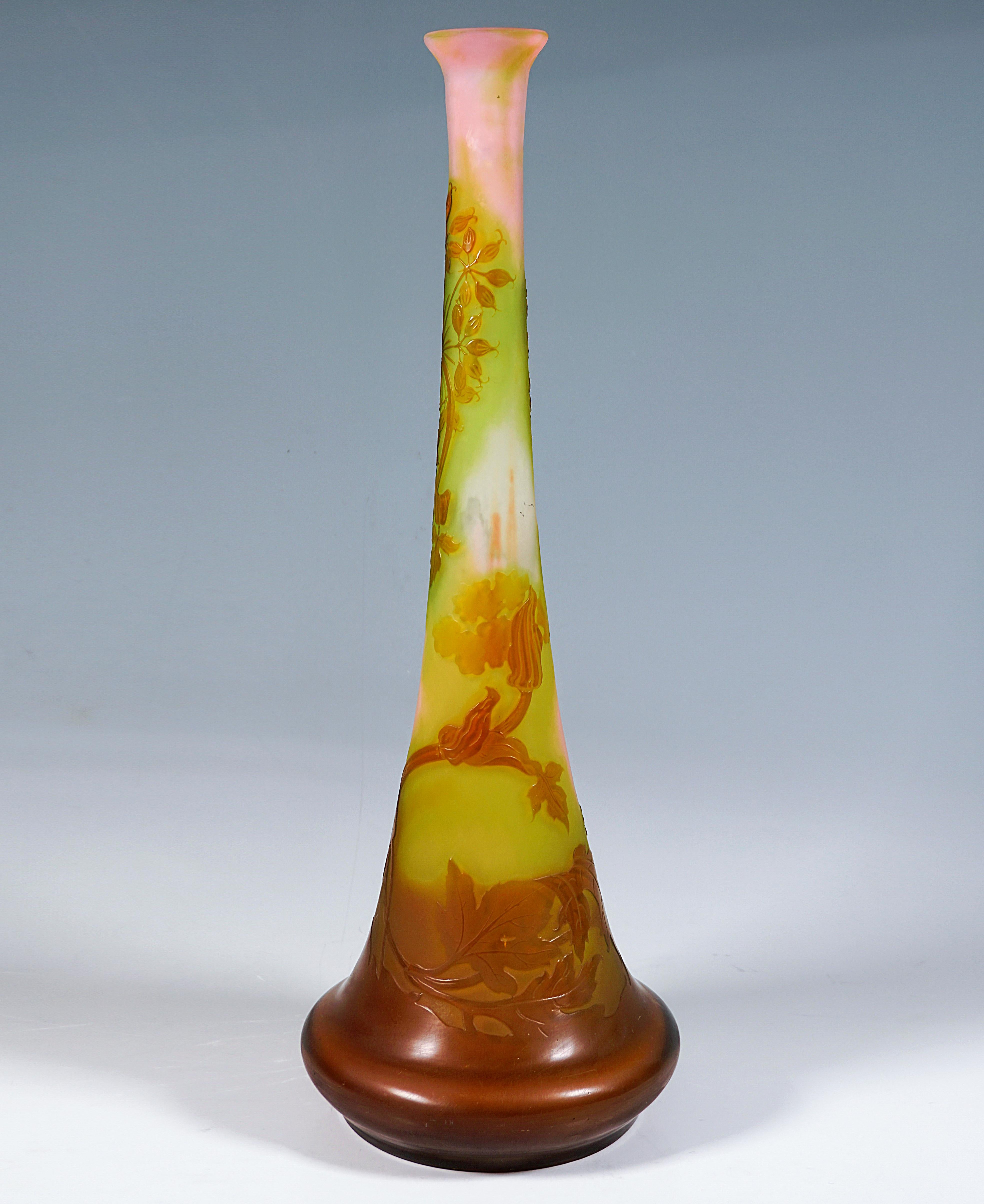 Vase with a large, round stand, widening like a bulge and then conically narrowing to a narrow opening with a flared rim, colorless glass with pink and light green colored powder inclusions, overlay in light brown, in various stages highly etched