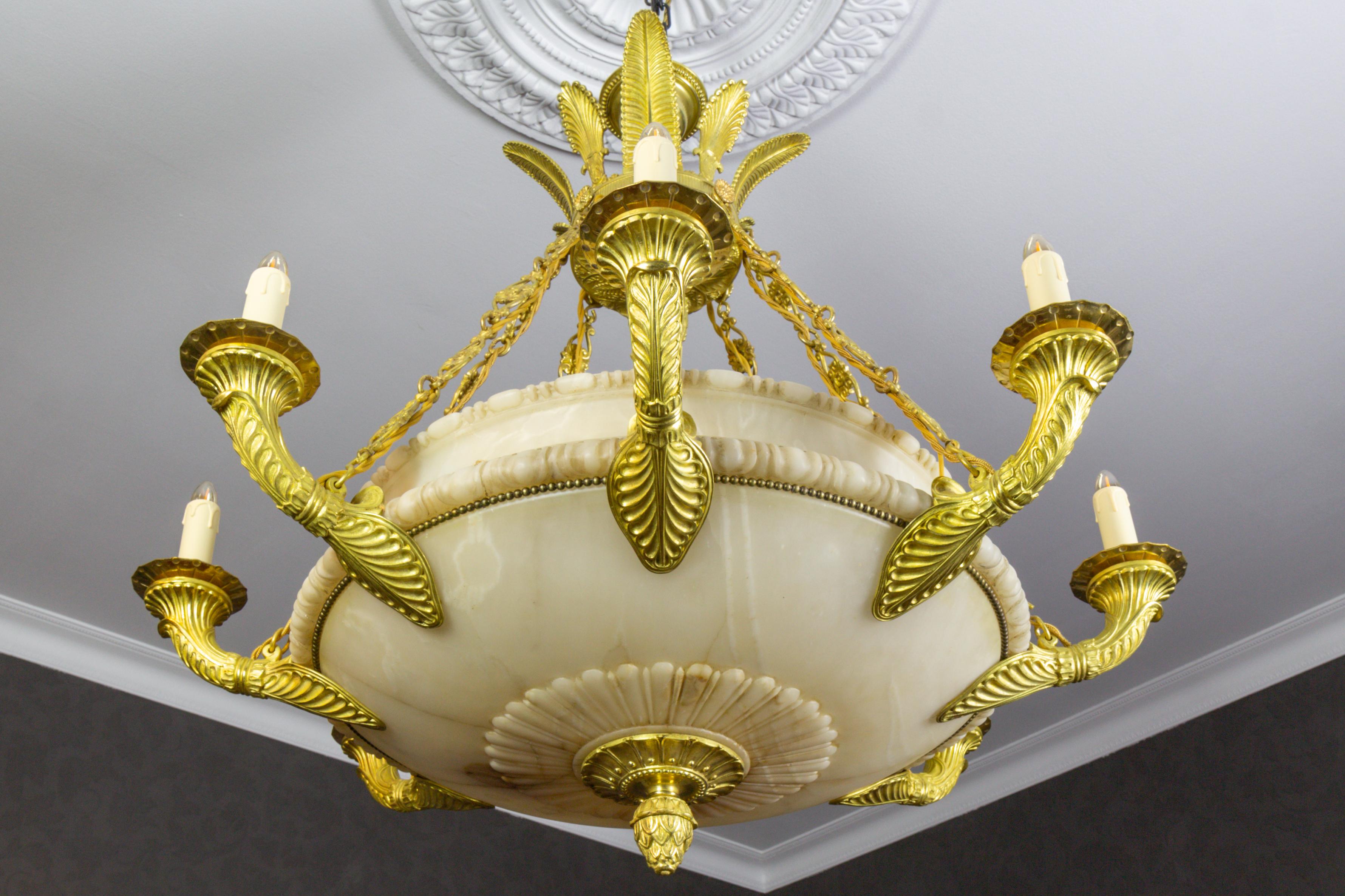 German Large Empire Style Alabaster and Bronze Sixteen-Light Chandelier, ca. 1920 For Sale