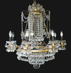 Large Empire Style Crystal and Ormolu Eight Light Chandelier