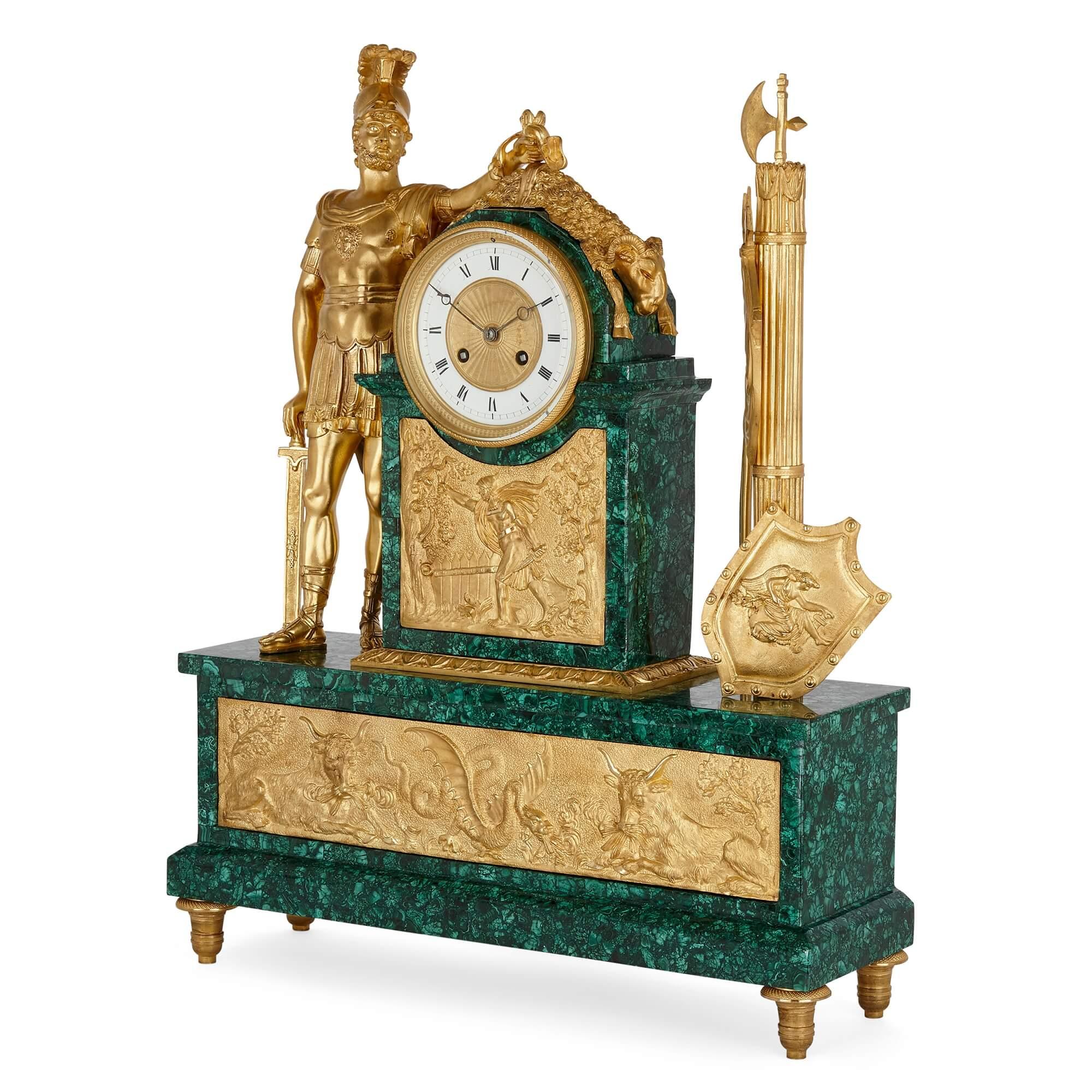 Large Empire style ormolu and malachite mantel clock with mythological sculpture
French, late 19th century
Measures: height 58cm, width 46cm, depth 14cm

With large sculptural work depicting Jason and the Golden Fleece, which is mounted above