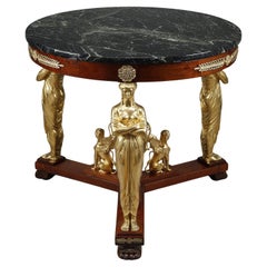 Gran mesa con pedestal estilo Imperio en caoba y chapado de caoba