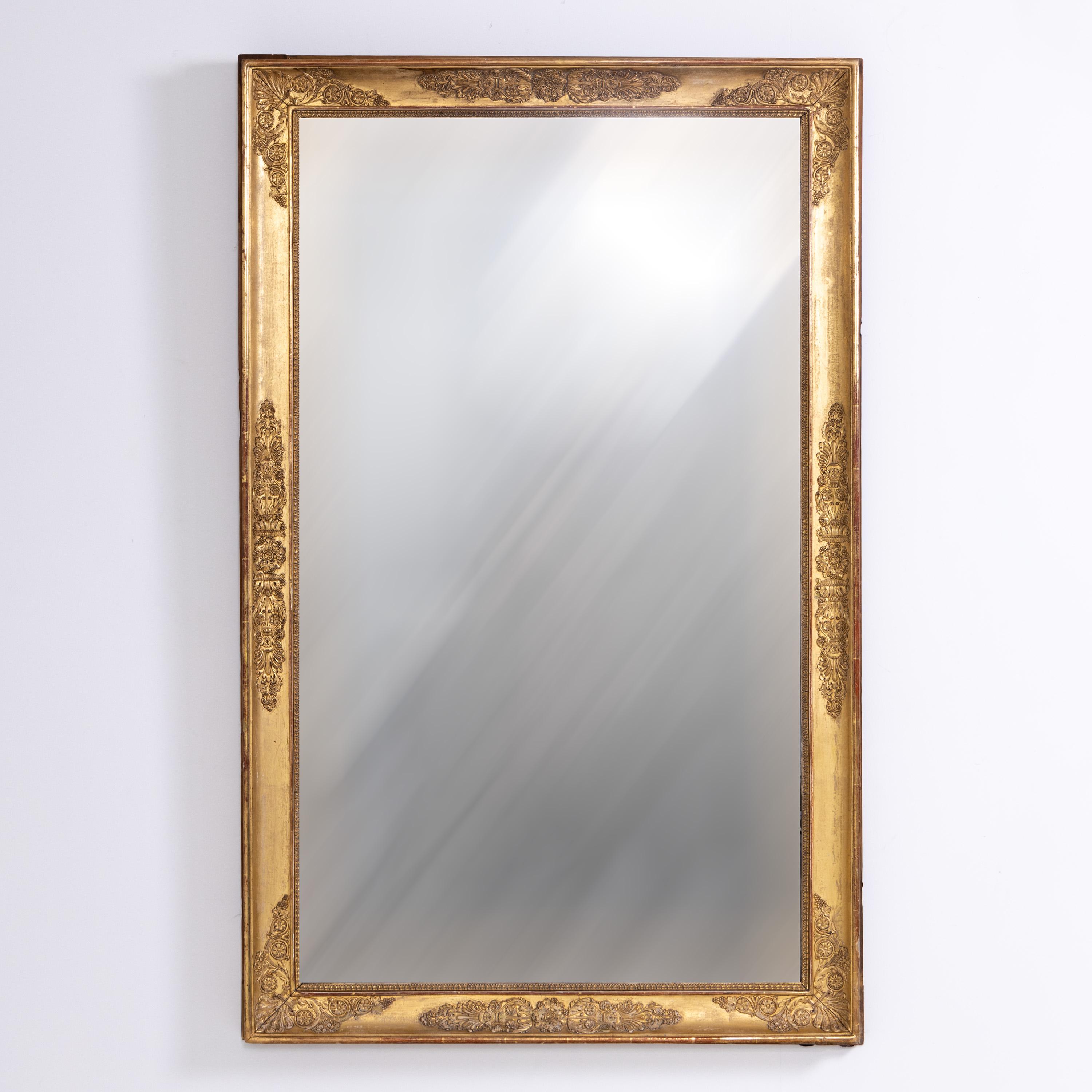European Large Empire Wall Mirror with gilt frame, early 19th Century For Sale