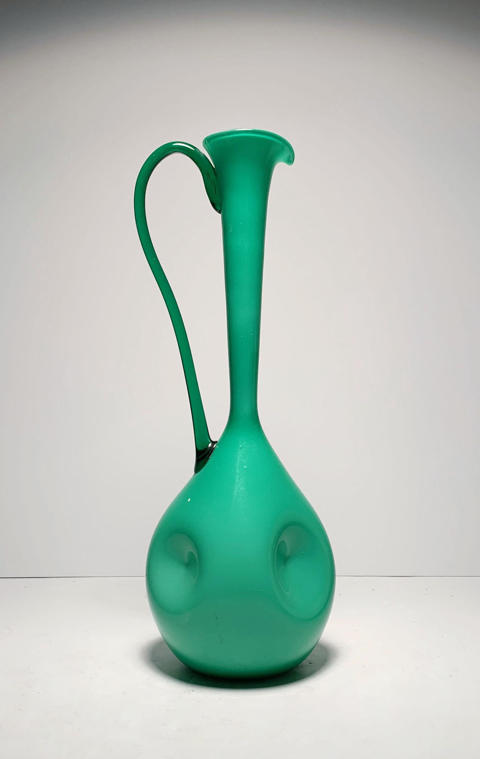 Large Empoli Italian glass green Ewer pitcher vase.

  