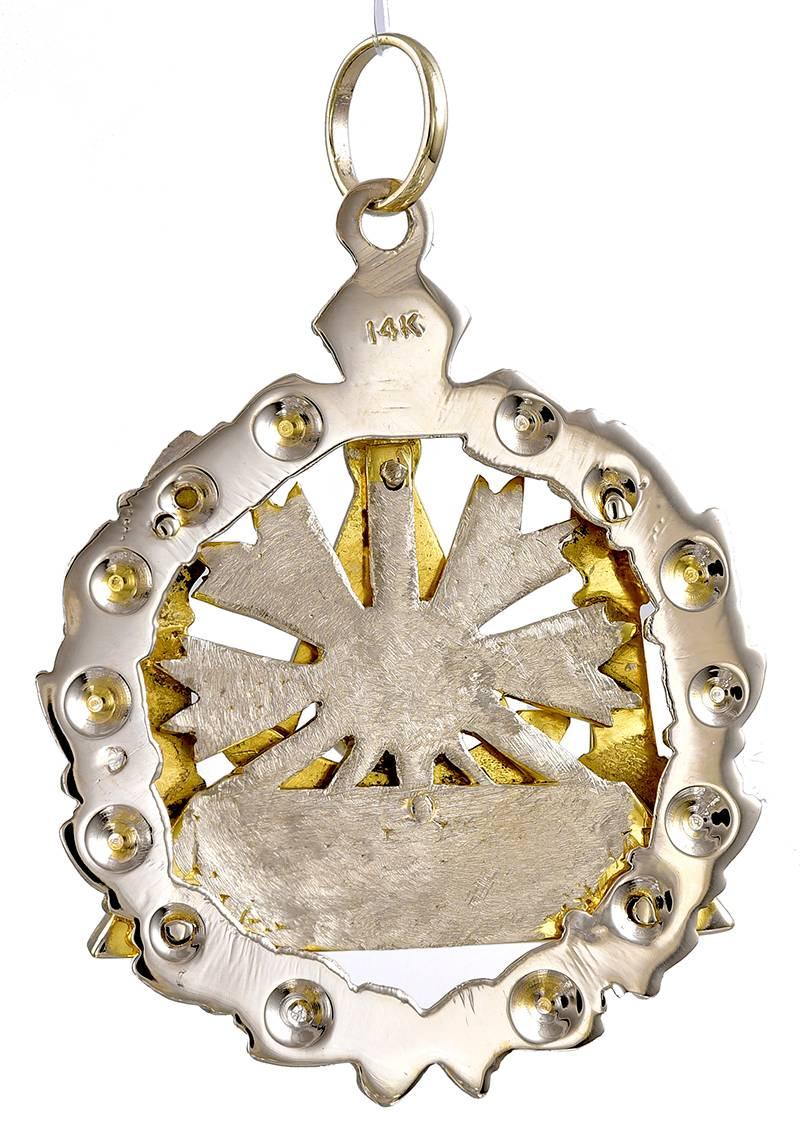 Large round Masonic emblem pendant.  14K yellow gold, with black and white enamel; set with a moonstone.  Three-dimensional.  1 1/3