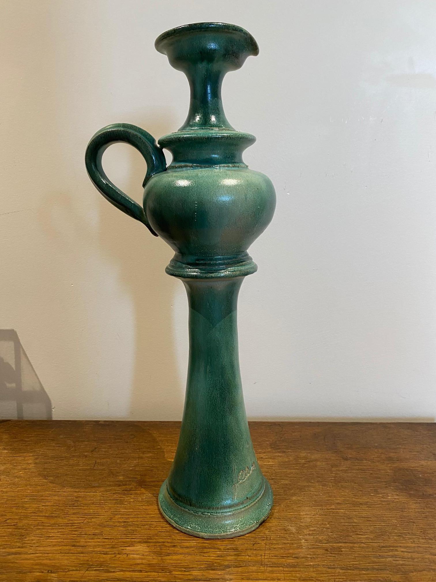 Jug in a rare green color with an enamel finish. Each piece is signed 