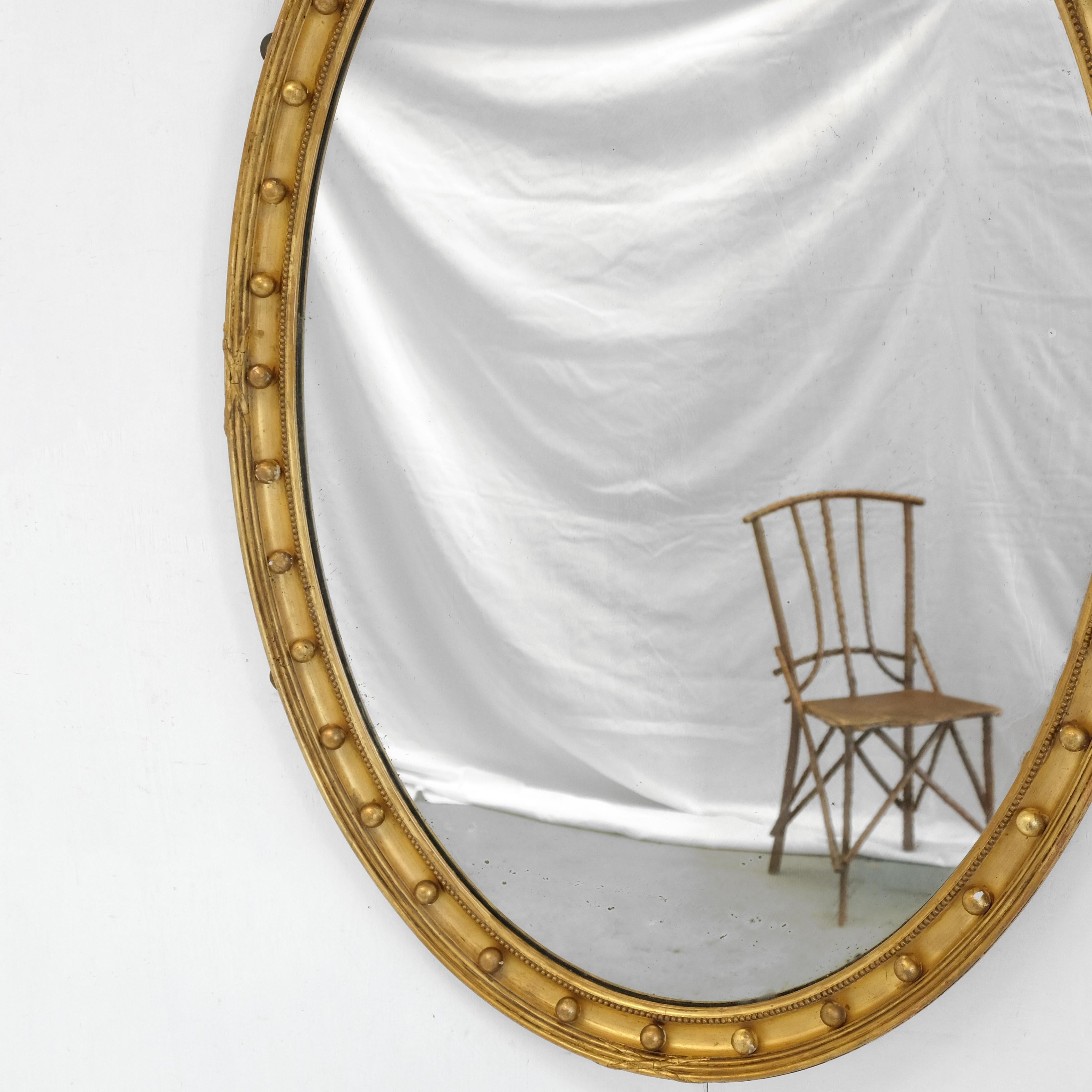 Hand-Crafted Large English 19th Century Giltwood Oval Mirror, Water Gilded, Georgian Style