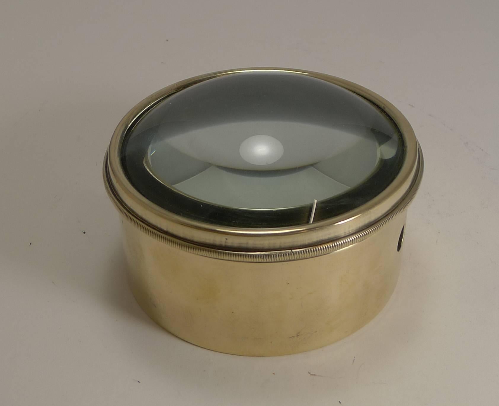 Always very popular and a very useful desk-top accessory. These large circular magnifiers actually are the condenser or magnifier from a Magic Lantern dating to circa 1910. They are rescued, polished up and put back to use in the modern day.

This