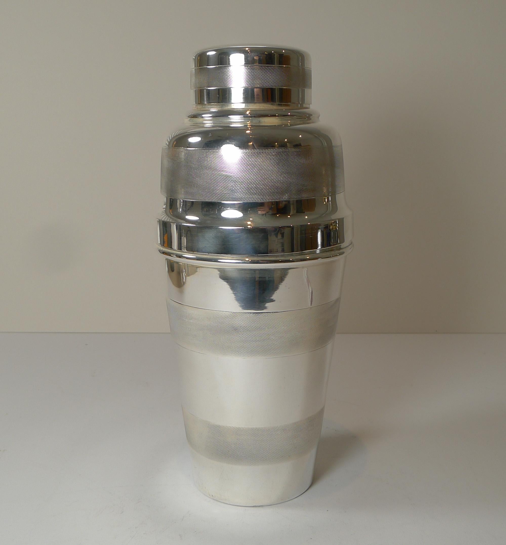 A magnificent example of an Art Deco cocktail shaker in silver plate, fully marked on the underside 