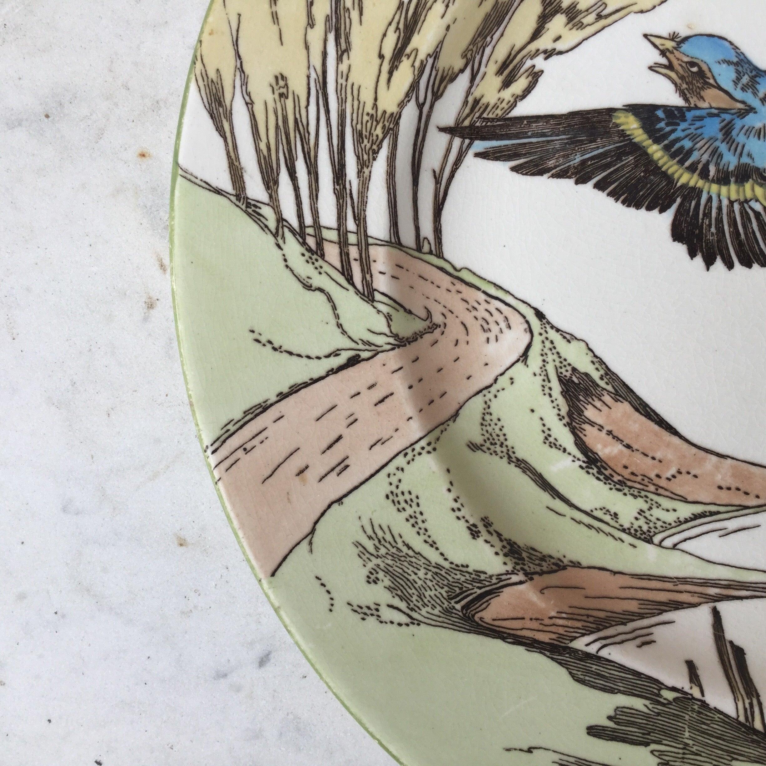 Large English blue bird plate in a landscape signed Mintons (mark 1873 to 1912).