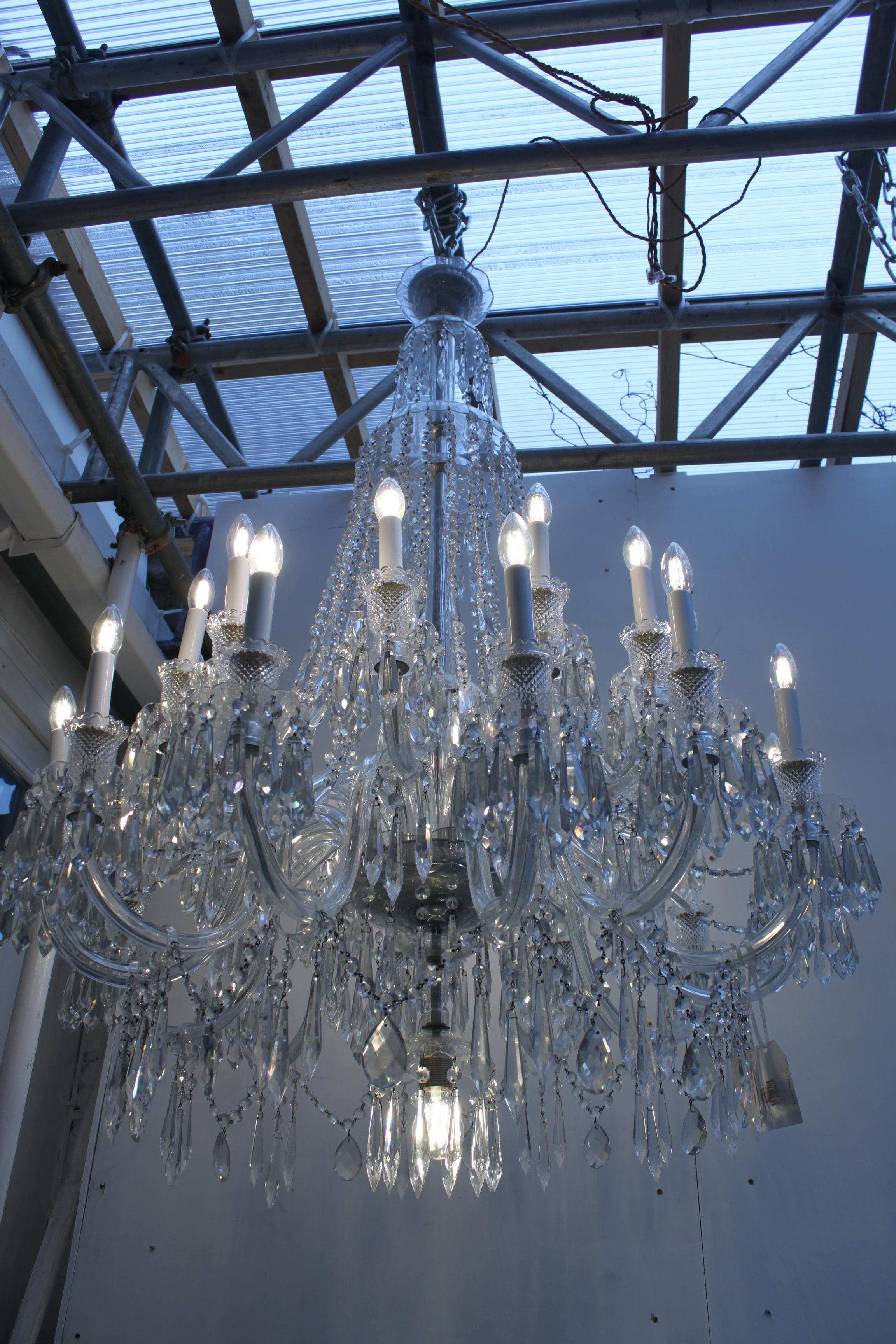 Early 20th Century Large English crystal chandeliers with crystal storm shades For Sale