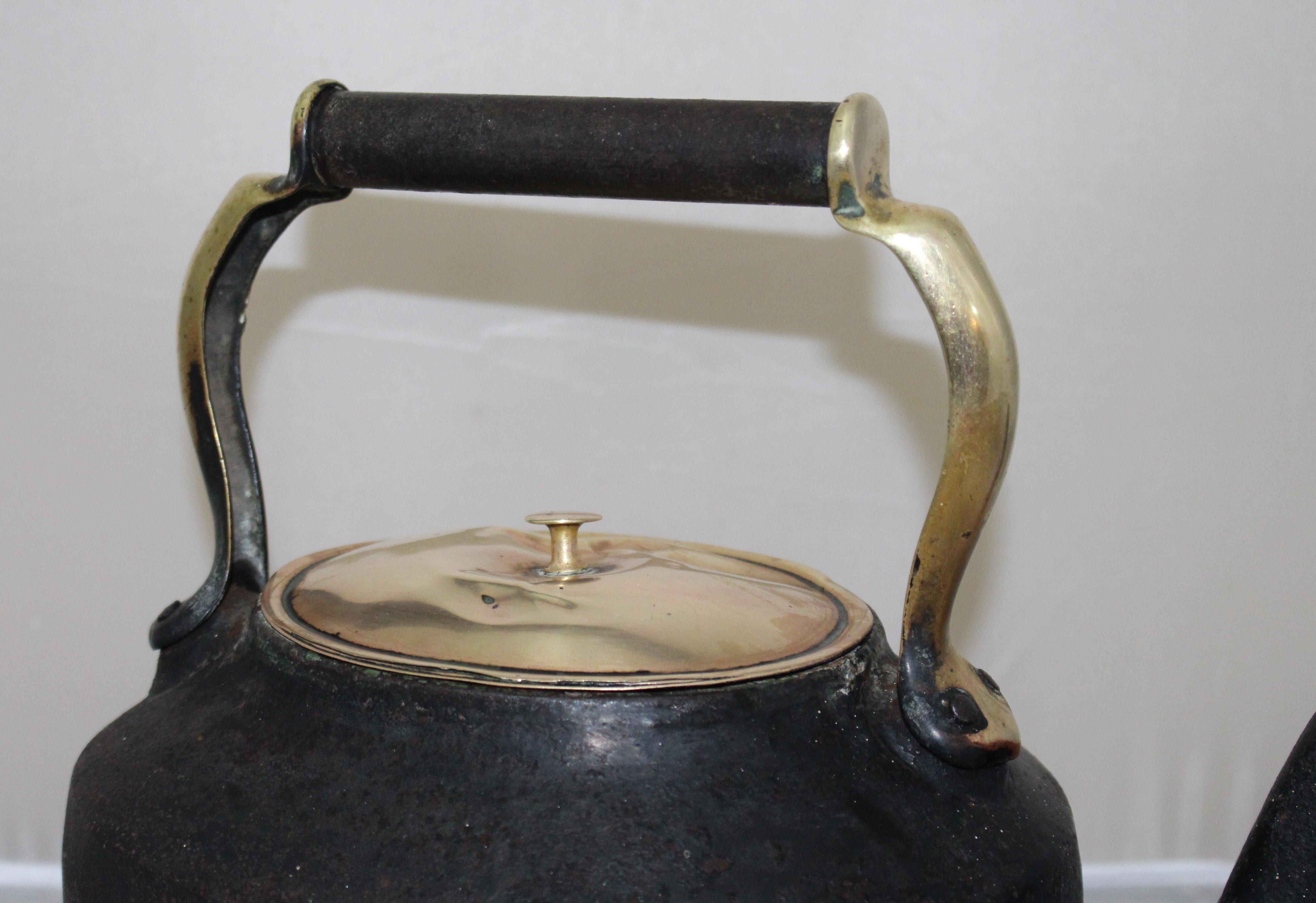 Manufacturers Baldwin (stamped to underside)
Origin made in England
Composition cast iron body, brass to handle and lid
Size: 34 x 20 x 28 (H) cm / 13 1/2 x 8 x 11 (H) in
Condition: Good condition commensurate with age. Very heavy. Some denting