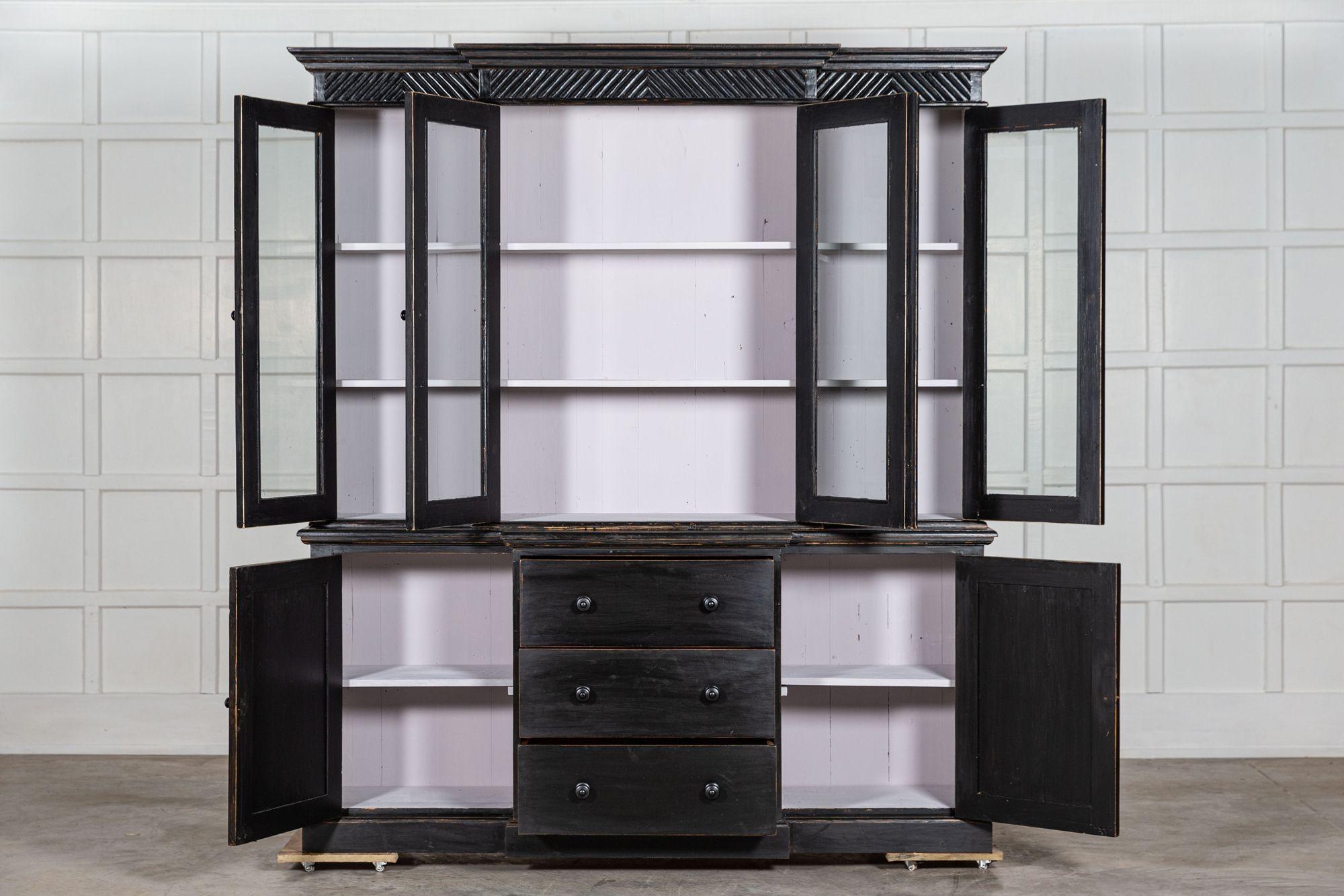 circa Mid-20thC
Large English Ebonised glazed pine breakfront bookcase cabinet
We can also customise existing pieces to suit your scheme/requirements. We have our own workshop, restorers and finishers. From adapting to finishing pieces including,