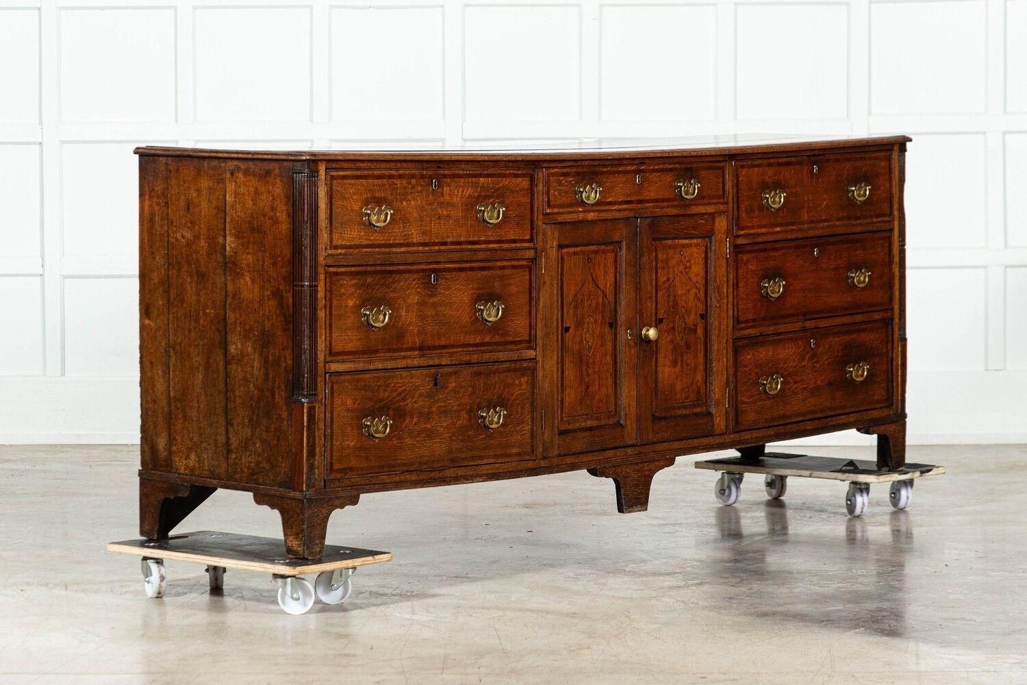 circa 1790
Large English George III Oak Inlaid Dresser Base
sku 1764
W216 x D51 x H85 cm.
Weight 90 Kg