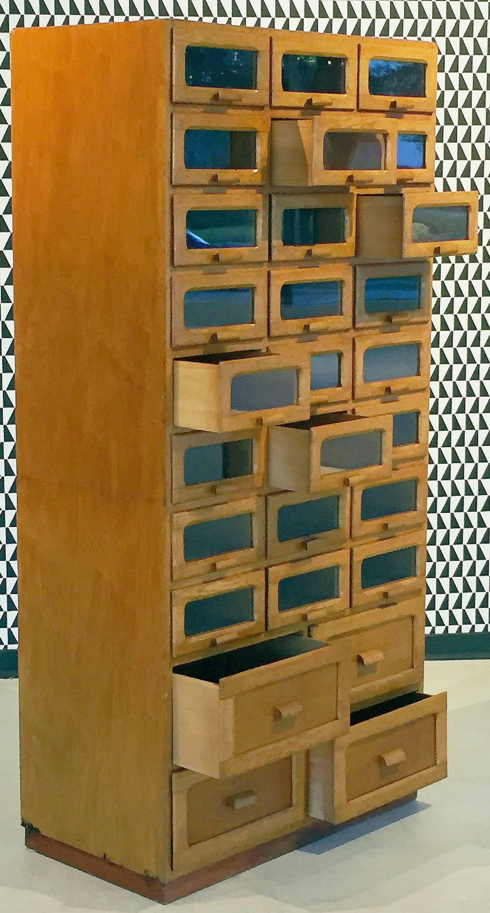 glass front chest of drawers