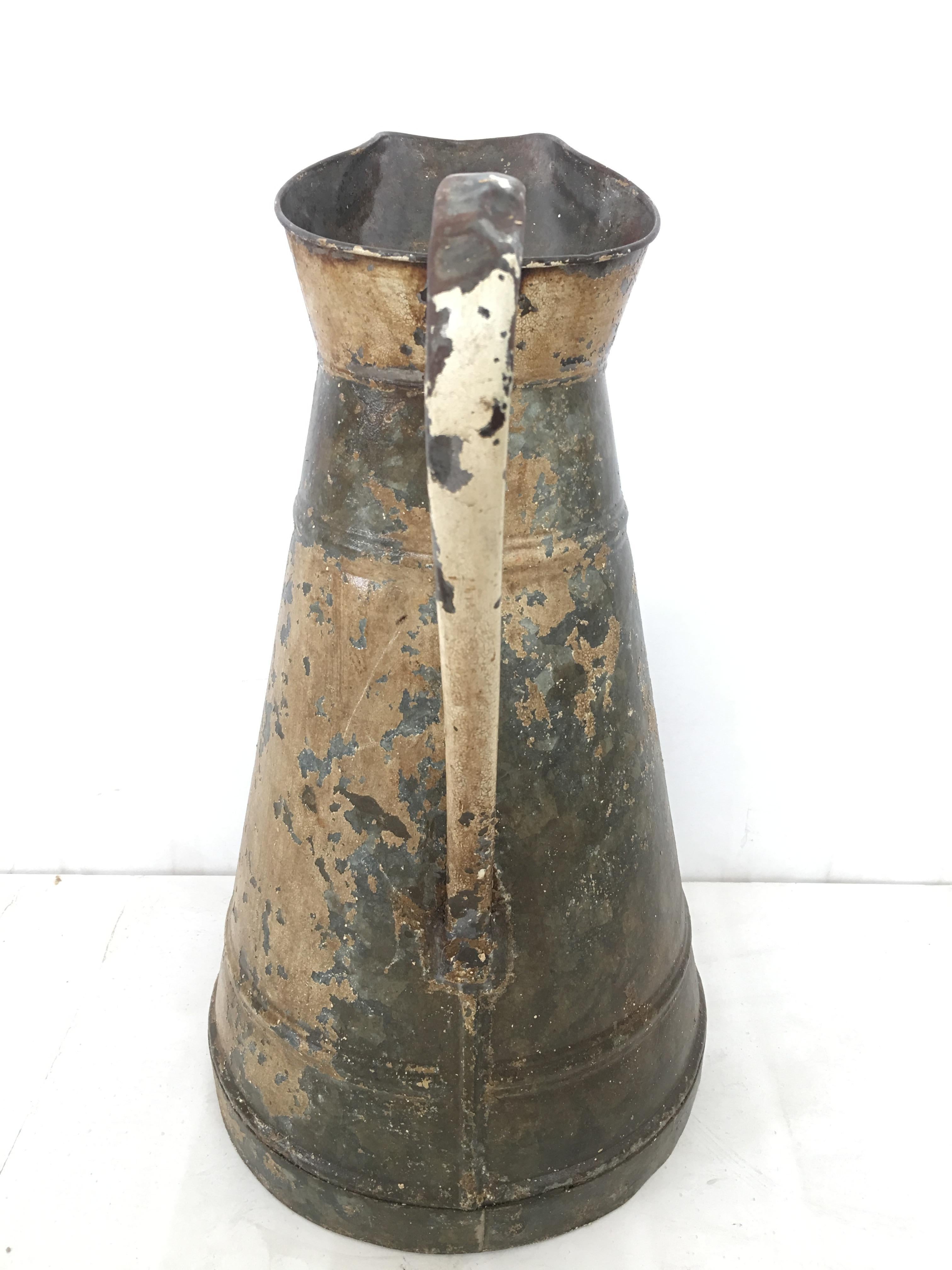 large metal pitcher