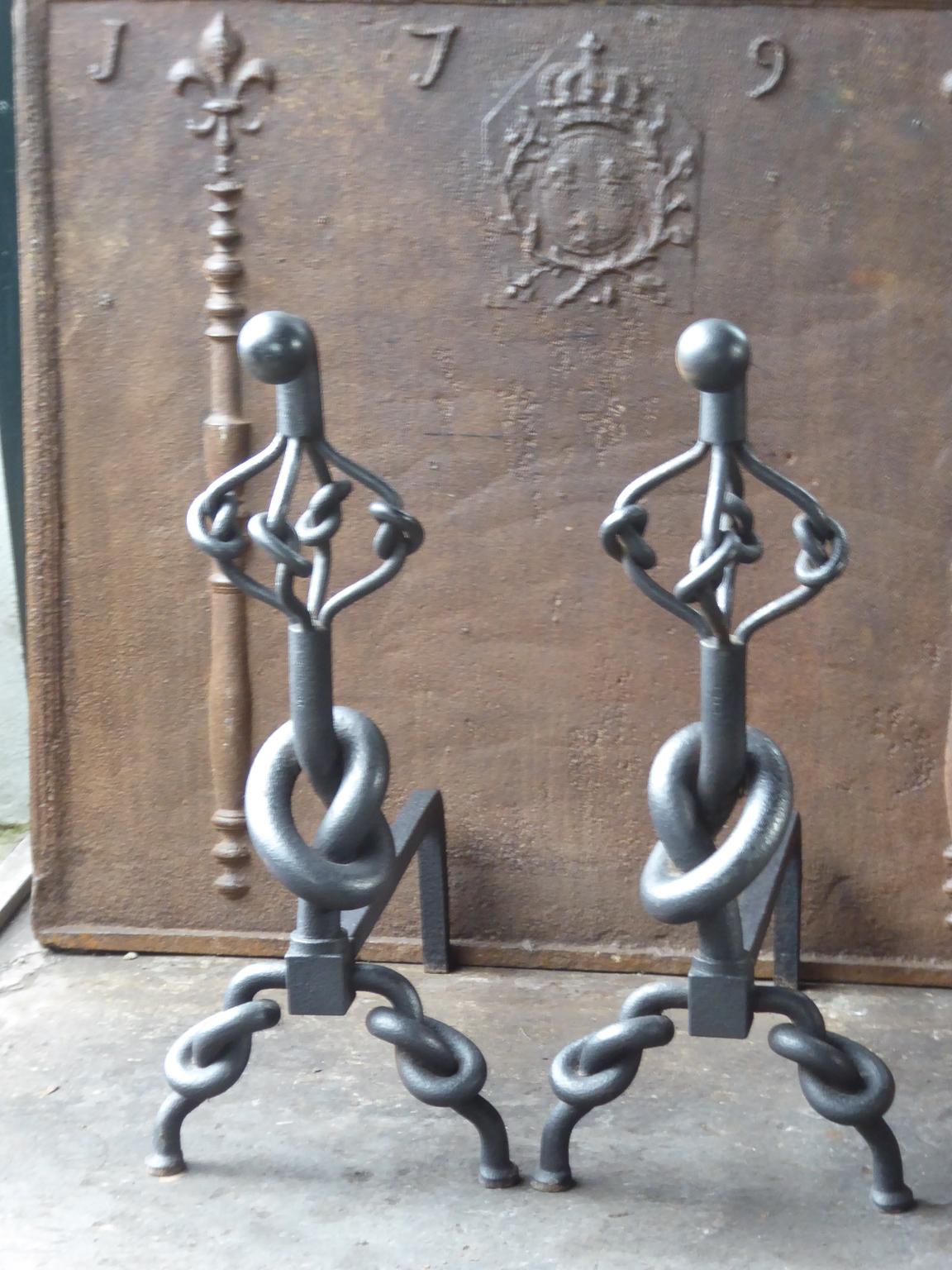 Beautifully forged large English andirons made of wrought iron. 


