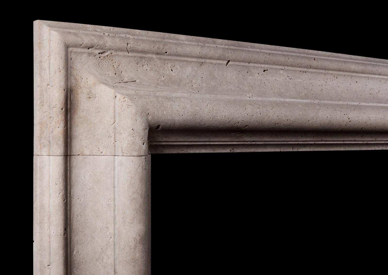 A large and imposing English moulded bolection fireplace in white Travertine stone. A good quality copy of the Queen Anne design. (Please Note: the shelf depth measurement (4.25?) is the projection of whole moulding.)

N.B. May be subject to an