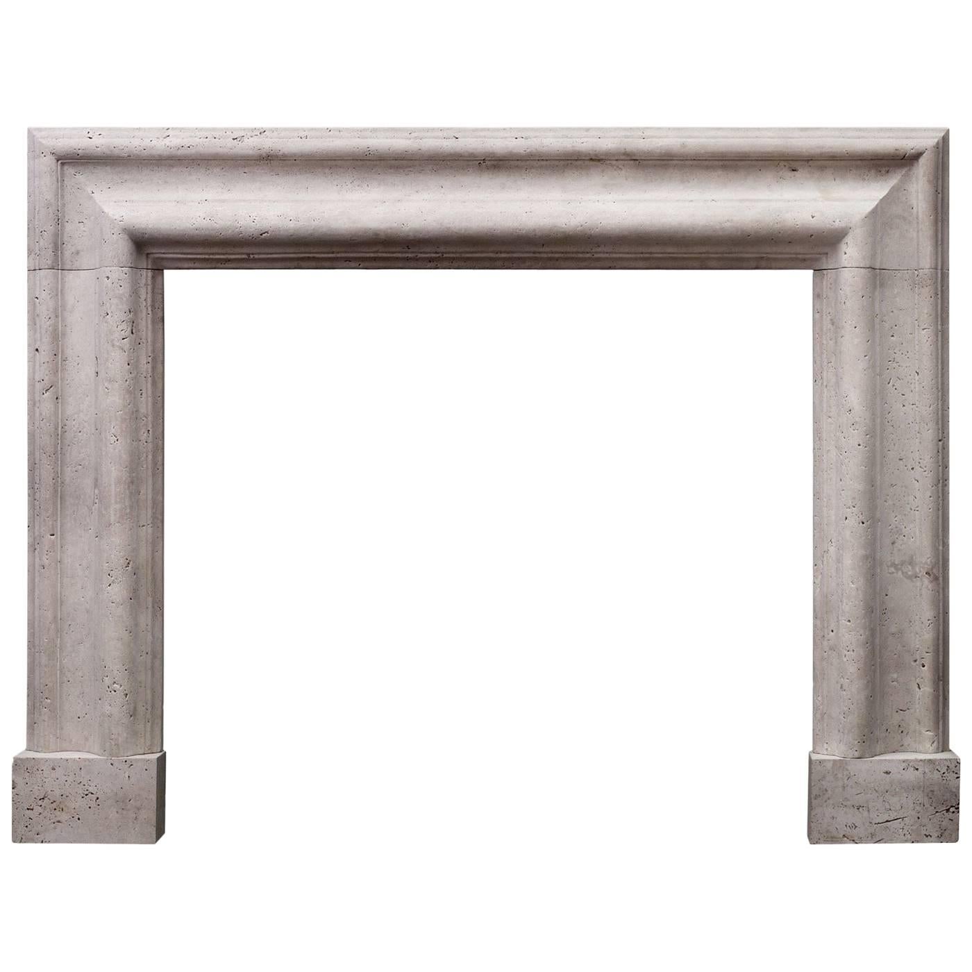 Large English Moulded Bolection Fireplace in White Travertine For Sale