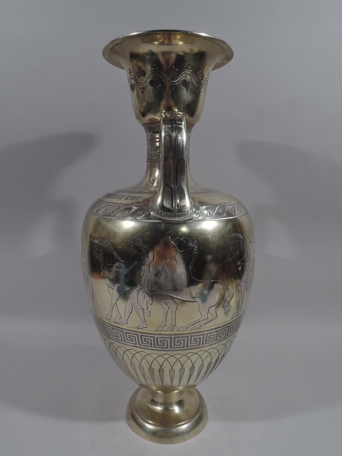 Large English Victorian sterling silver urn, 1866. Traditional Amphora with bell mouth. Parcel gilt with frieze depicting drapery-clad men and horses inspired by ancient pottery. Midcentury Neo-Grec design with stylized ornament including Classical