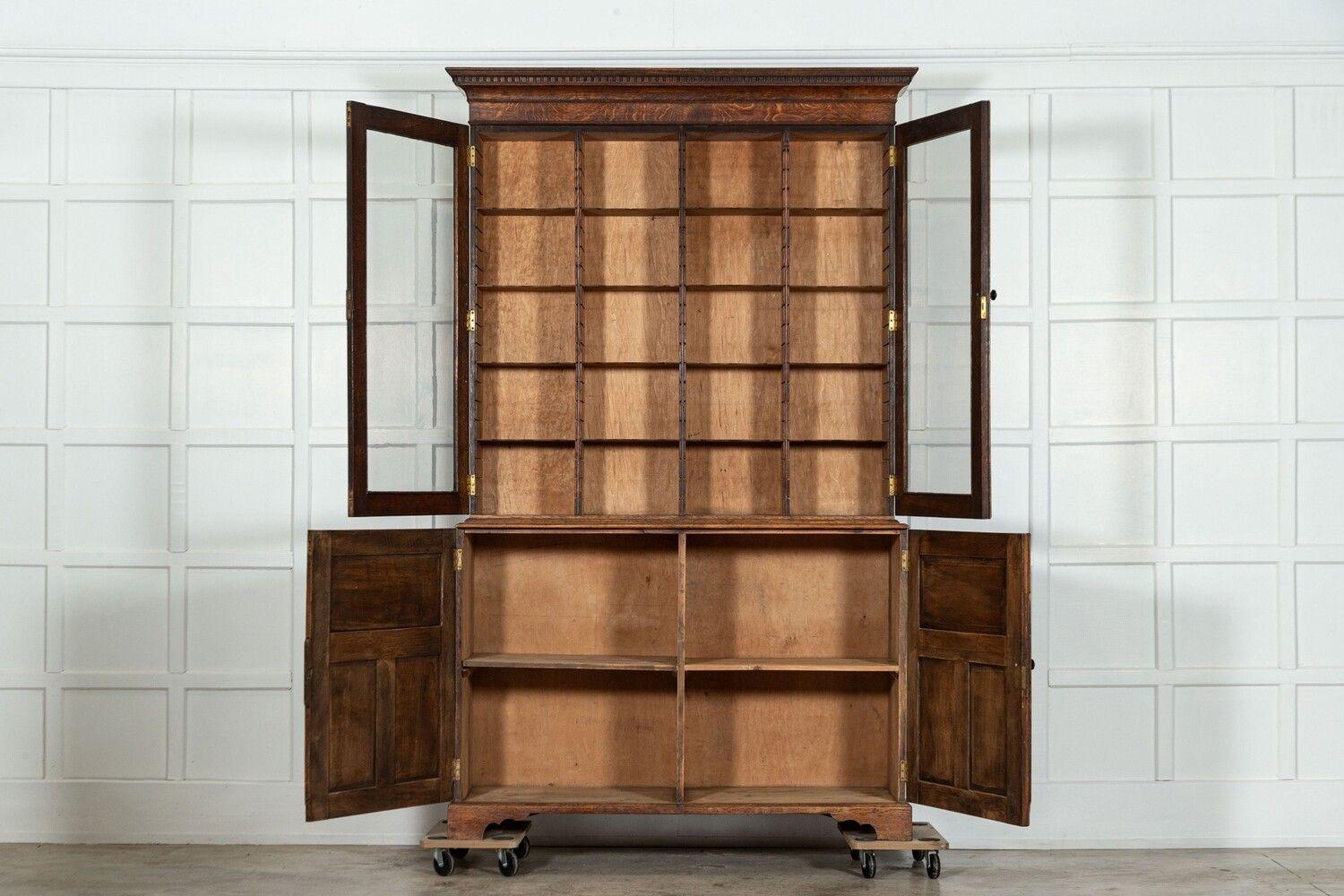 circa 1900
Large English Oak Glazed Bookcase / Vitrine
sku 1671
Base W138 x D48 x H96 cm
Top W146 x D33 x H140 cm
Together W146 x D48 x H236 cm