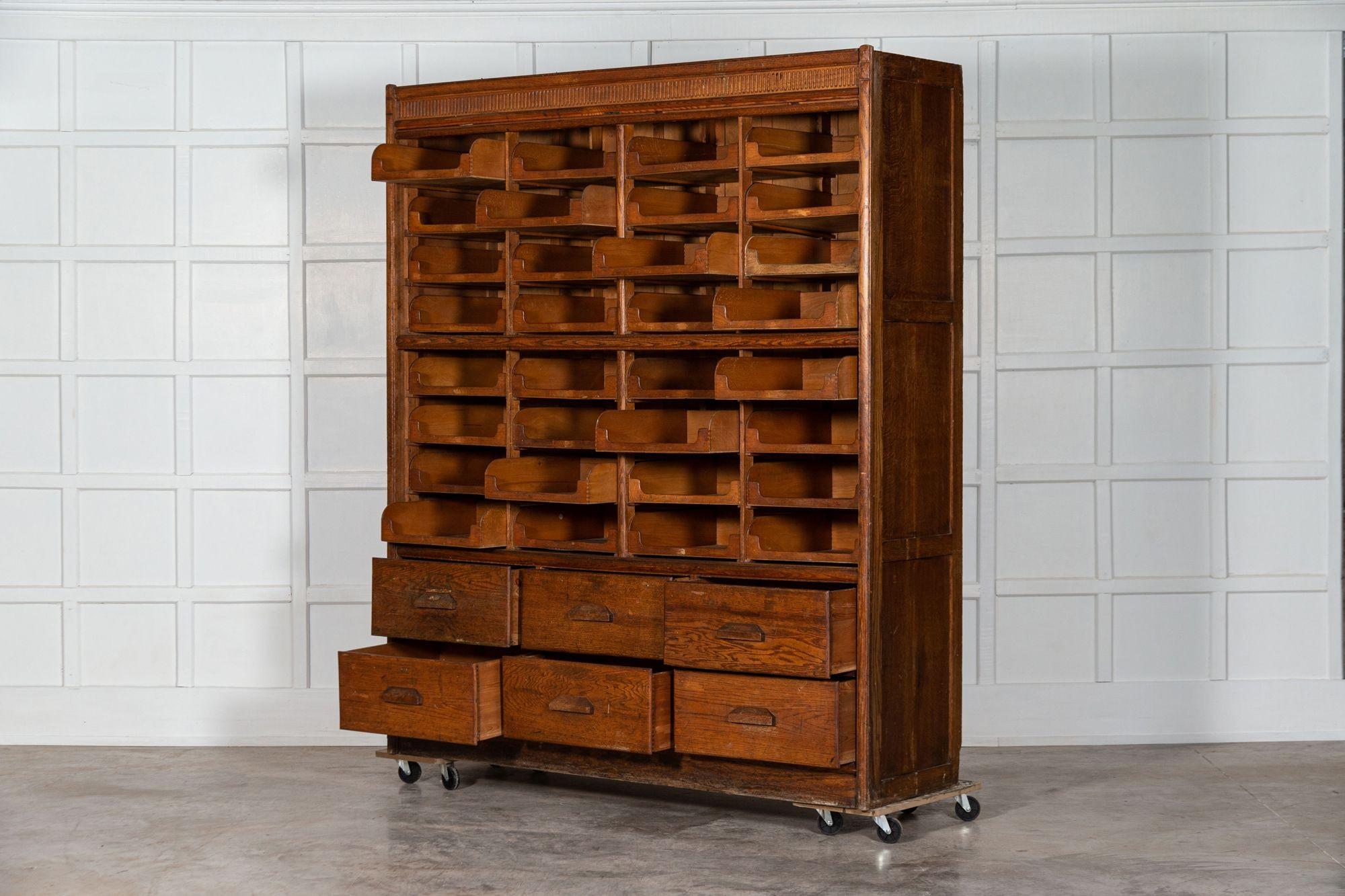 circa 1920
Large English Oak Haberdashery Cabinet
sku 1451
W184 x D54 x H213 cm.
